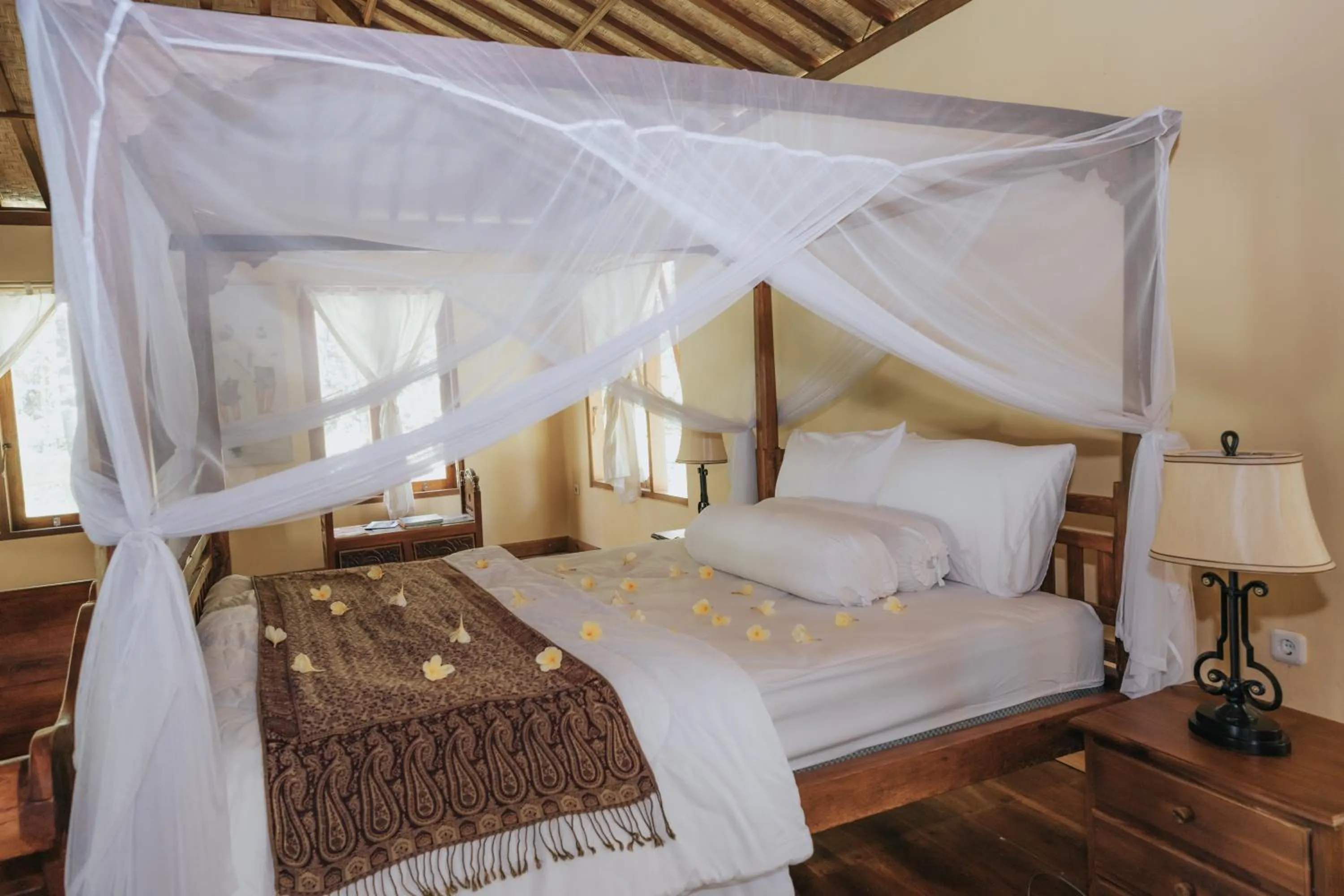 Bed in Saridevi Ecolodge