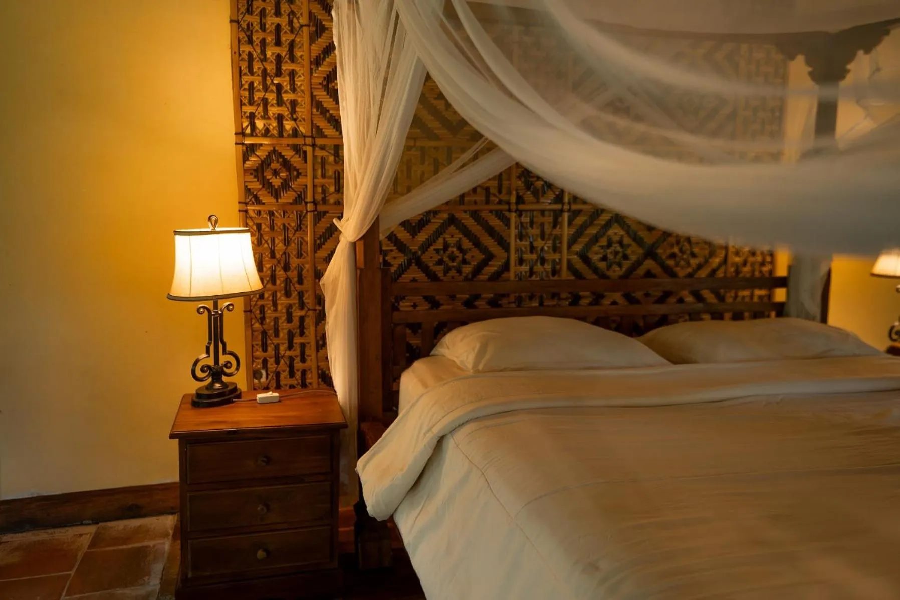 Bed in Saridevi Ecolodge