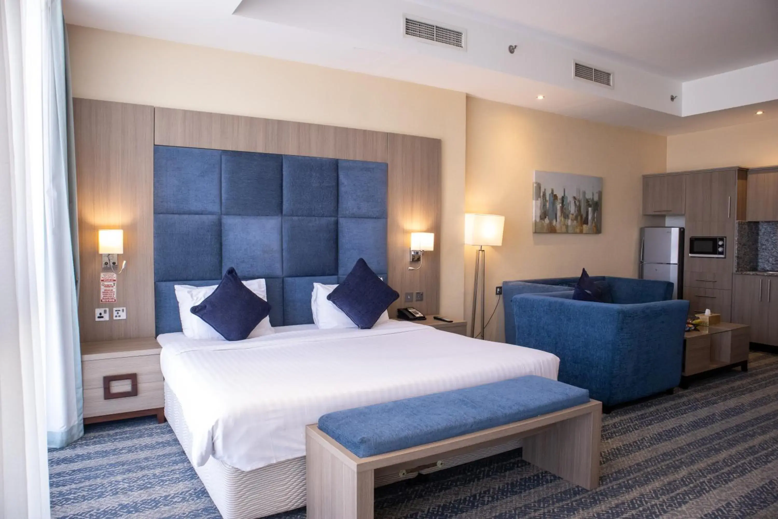 Seating area, Bed in The CASTLE PREMIUM HOTEL Seating area, Bed in The CASTLE PREMIUM HOTEL