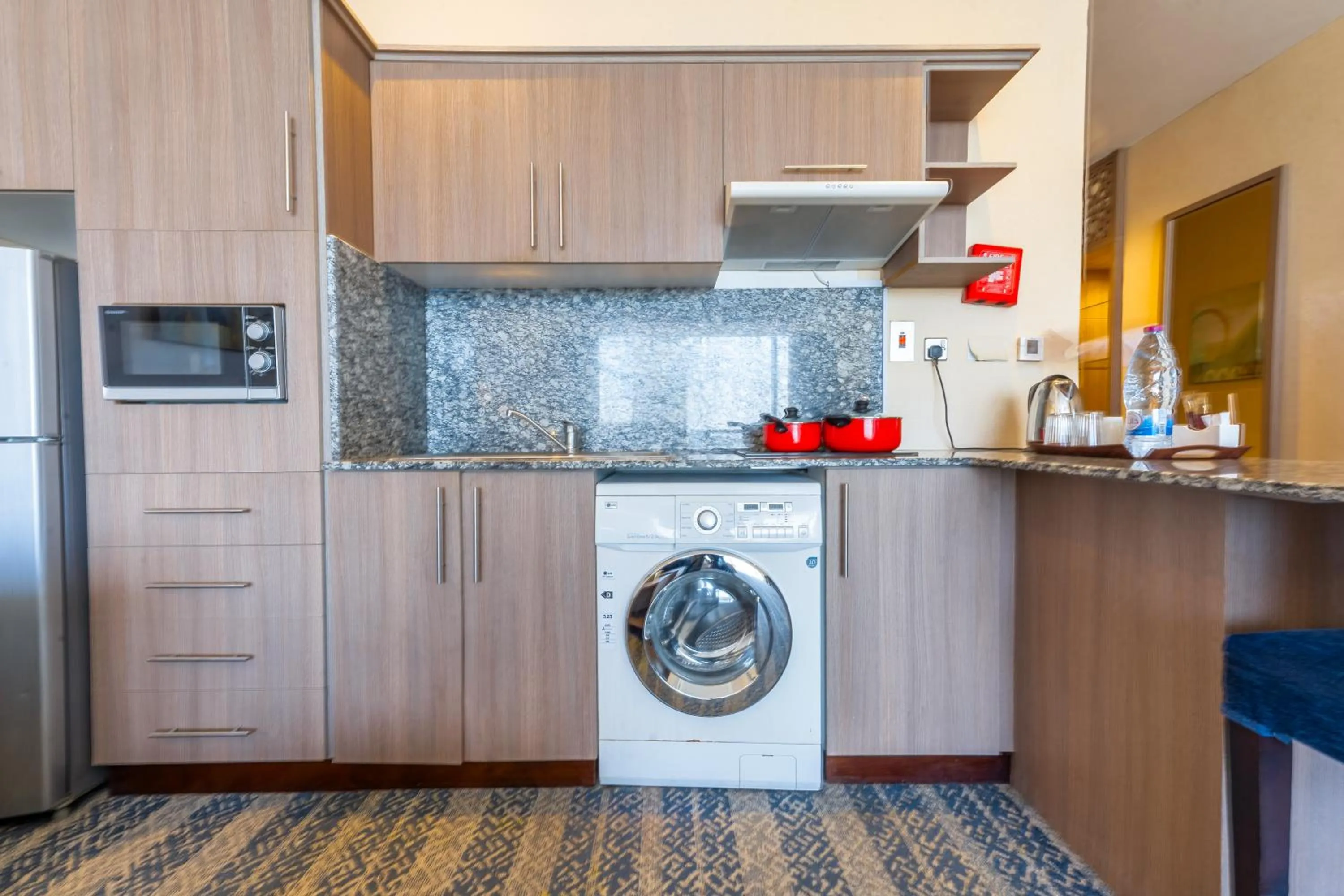 Kitchen or kitchenette in The CASTLE PREMIUM HOTEL