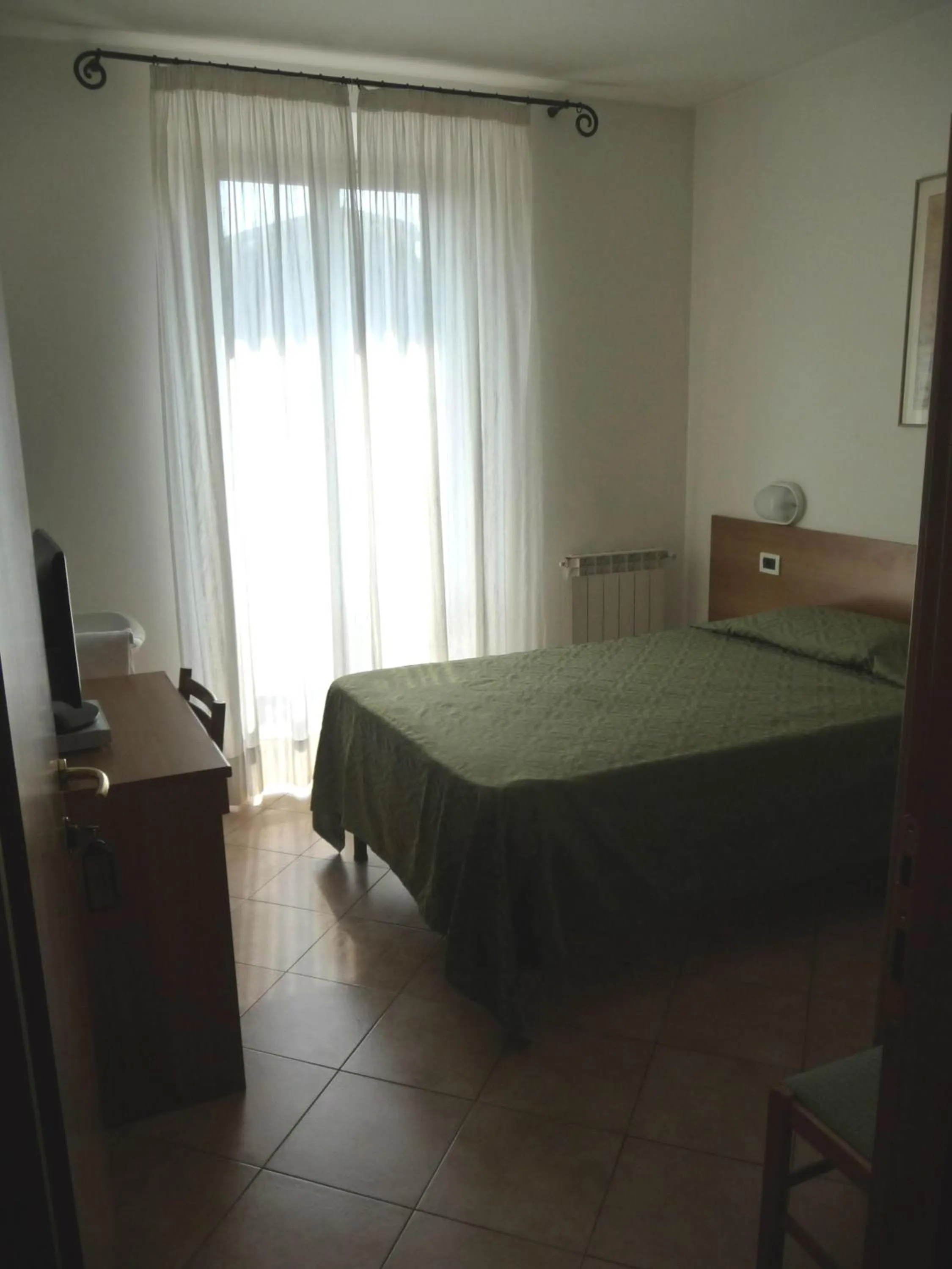 Bedroom, Bed in Hotel La Toscana