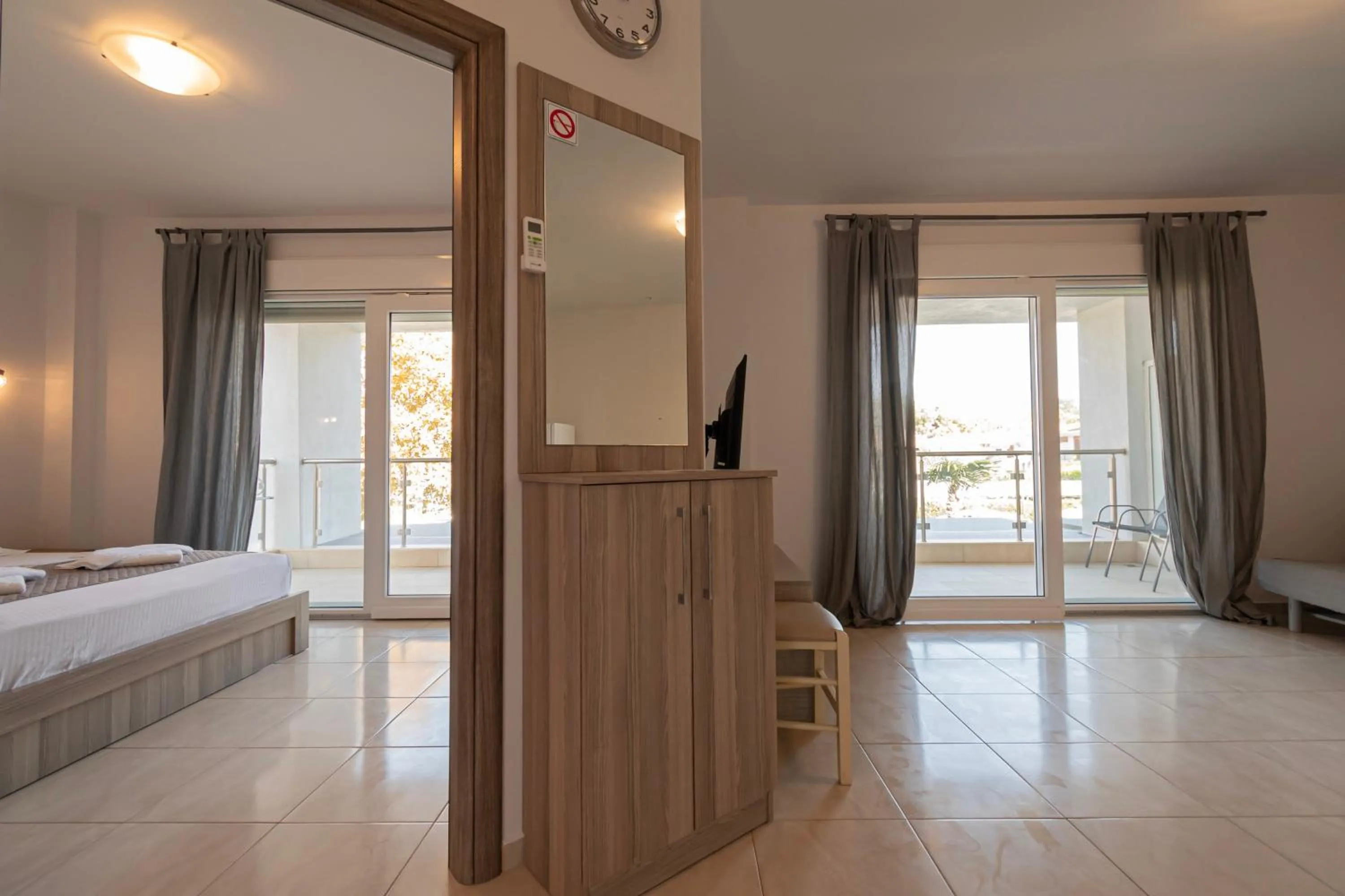 Seating area, Bed in EllinFos Apartments