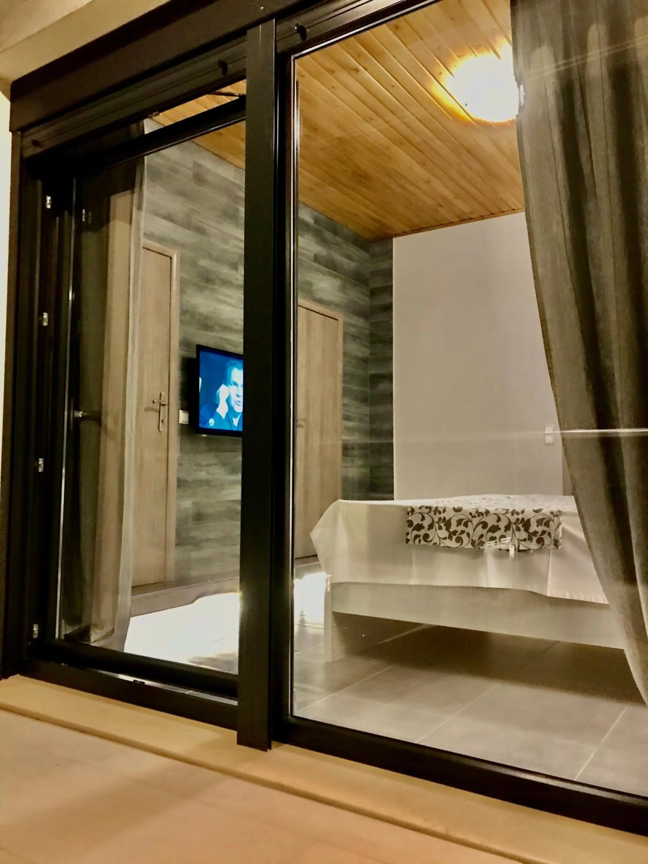 Bed in EllinFos Apartments