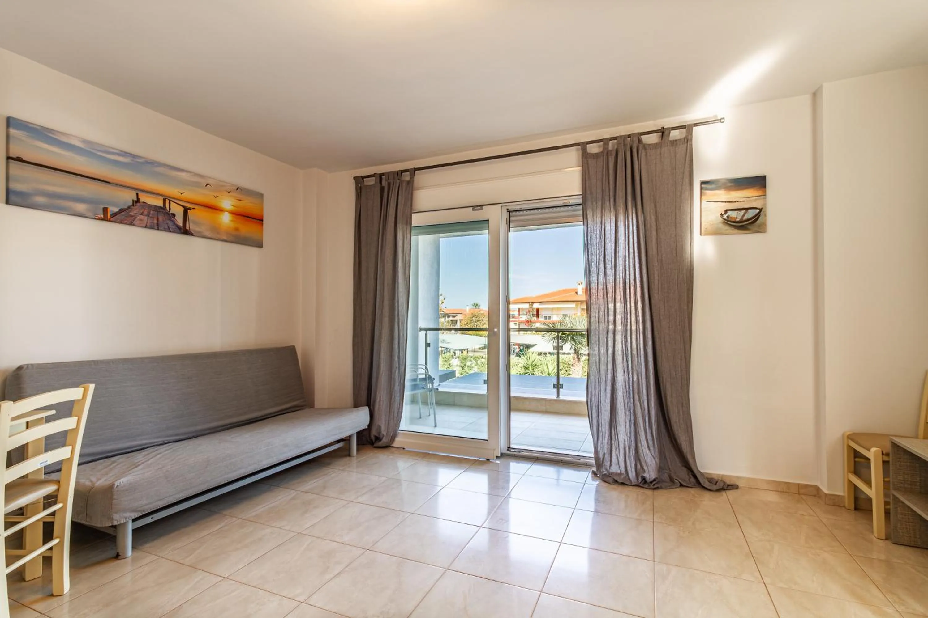 Seating area, Bed in EllinFos Apartments