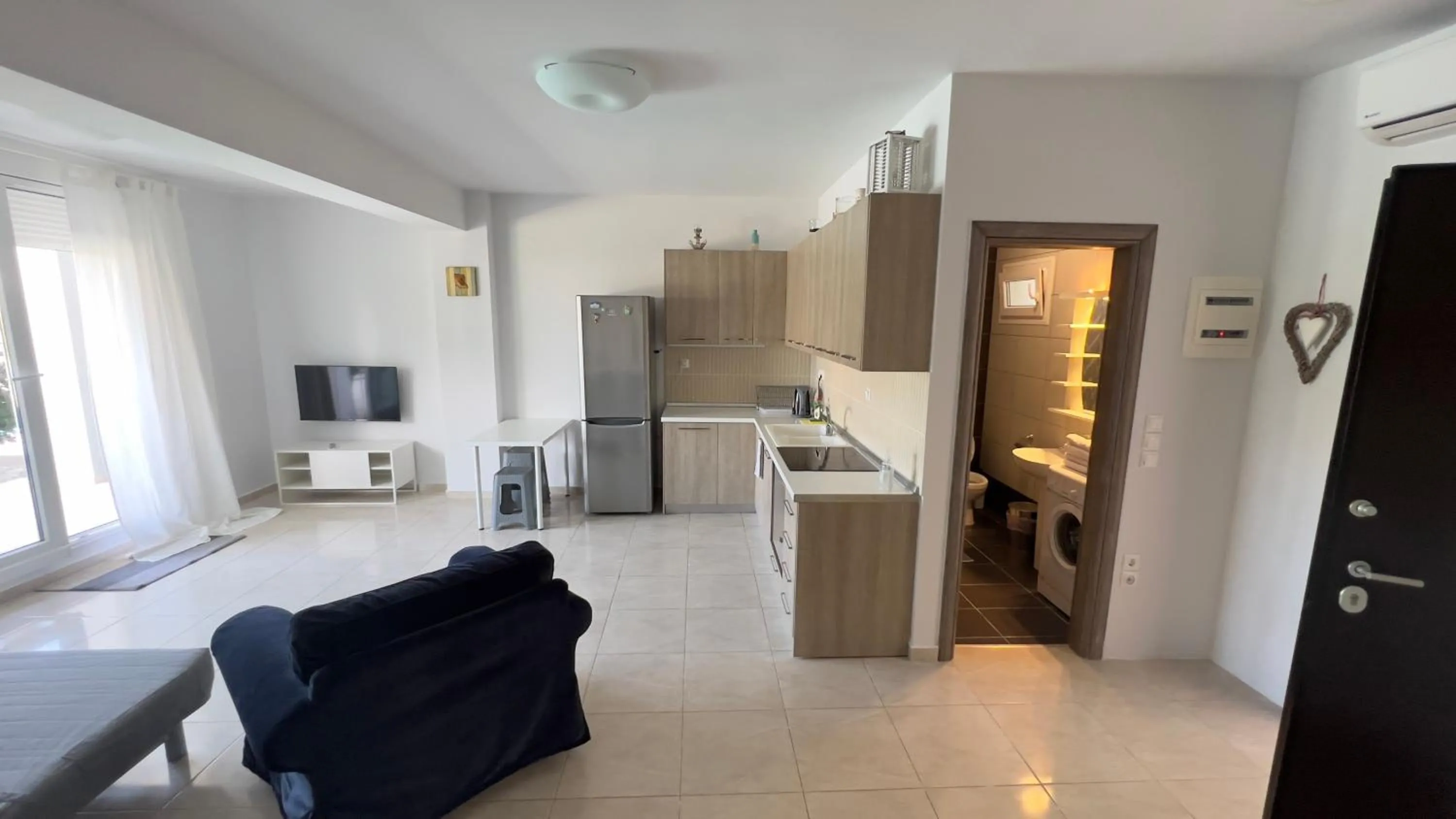 TV and multimedia in EllinFos Apartments