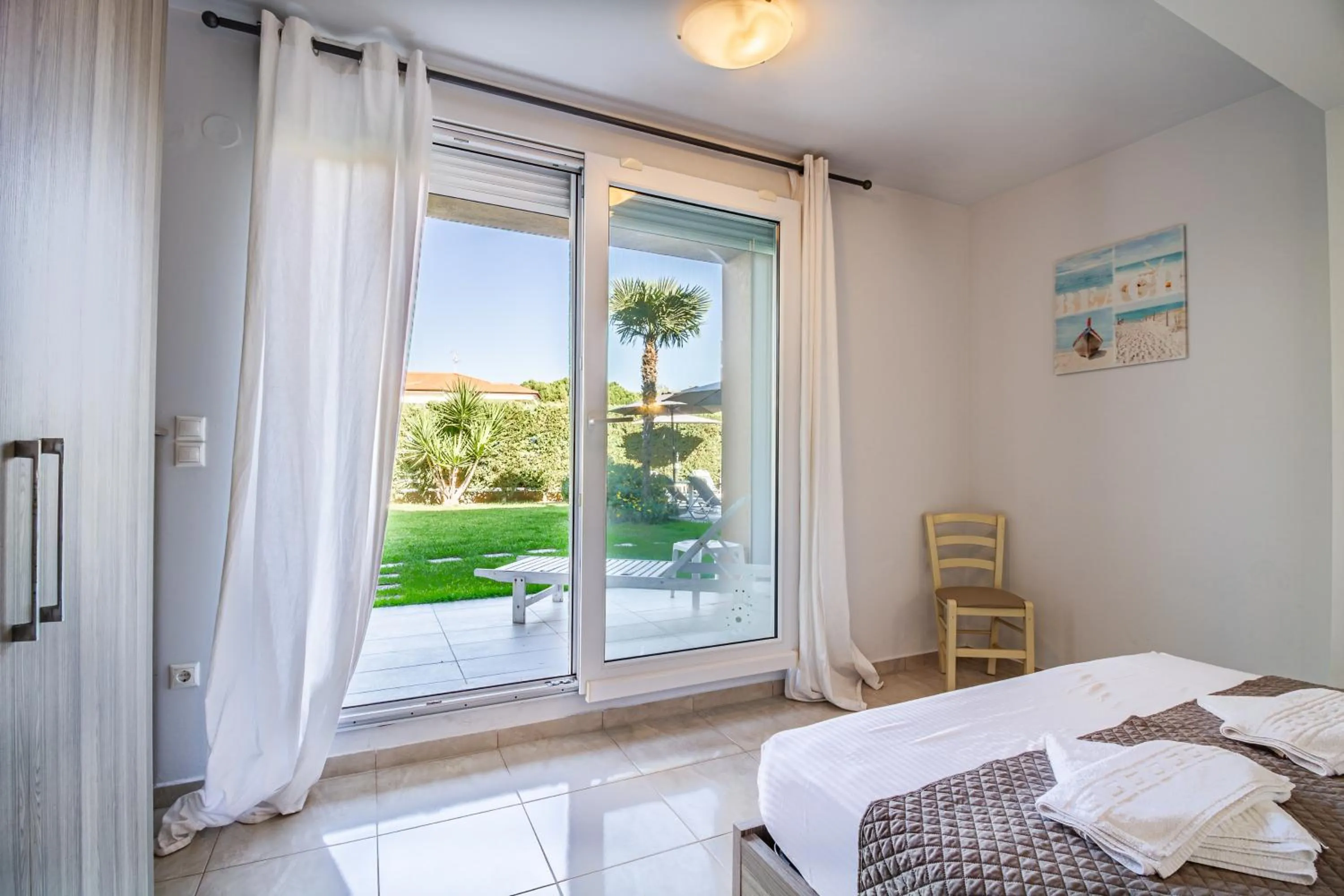 Bed in EllinFos Apartments