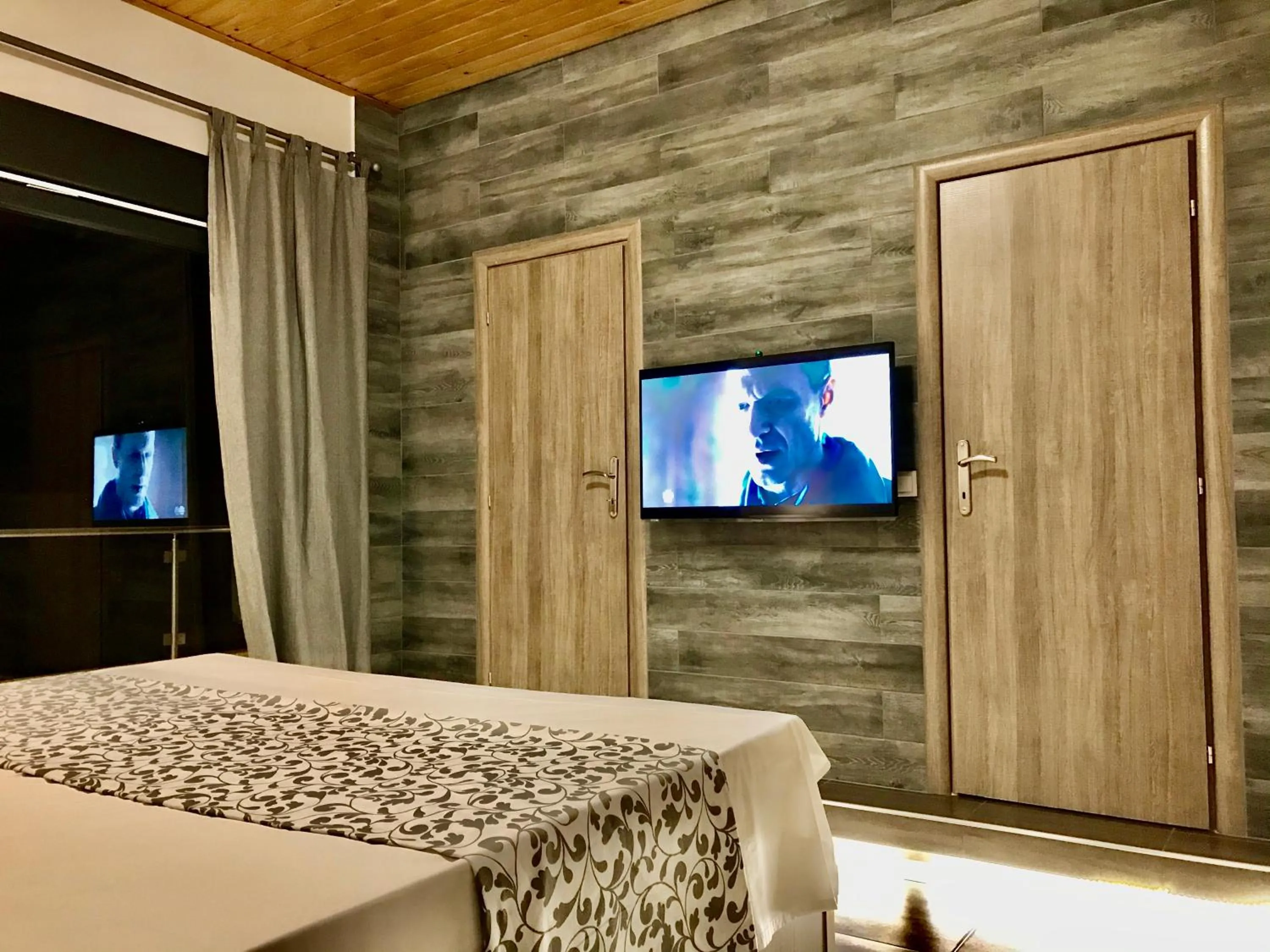 Bed in EllinFos Apartments