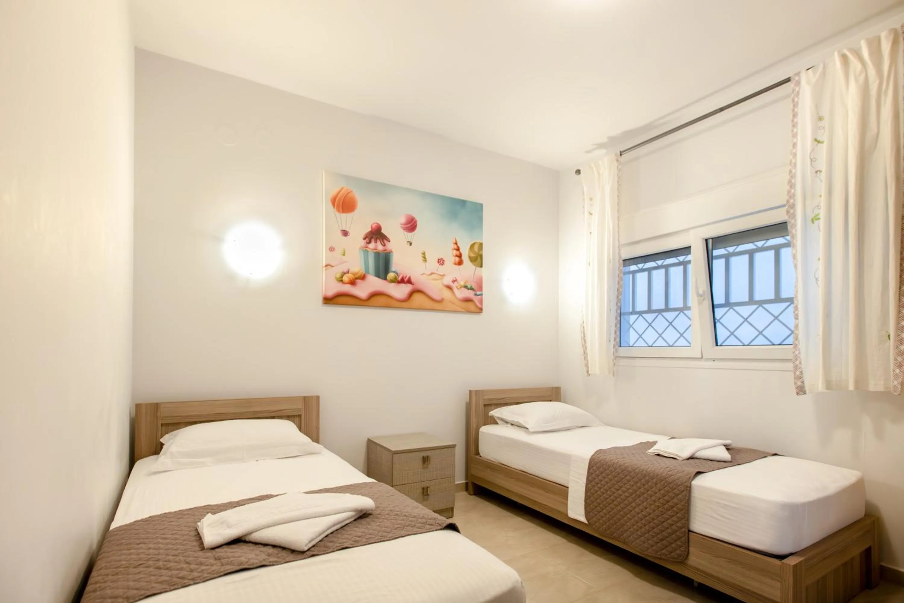 Bed in EllinFos Apartments