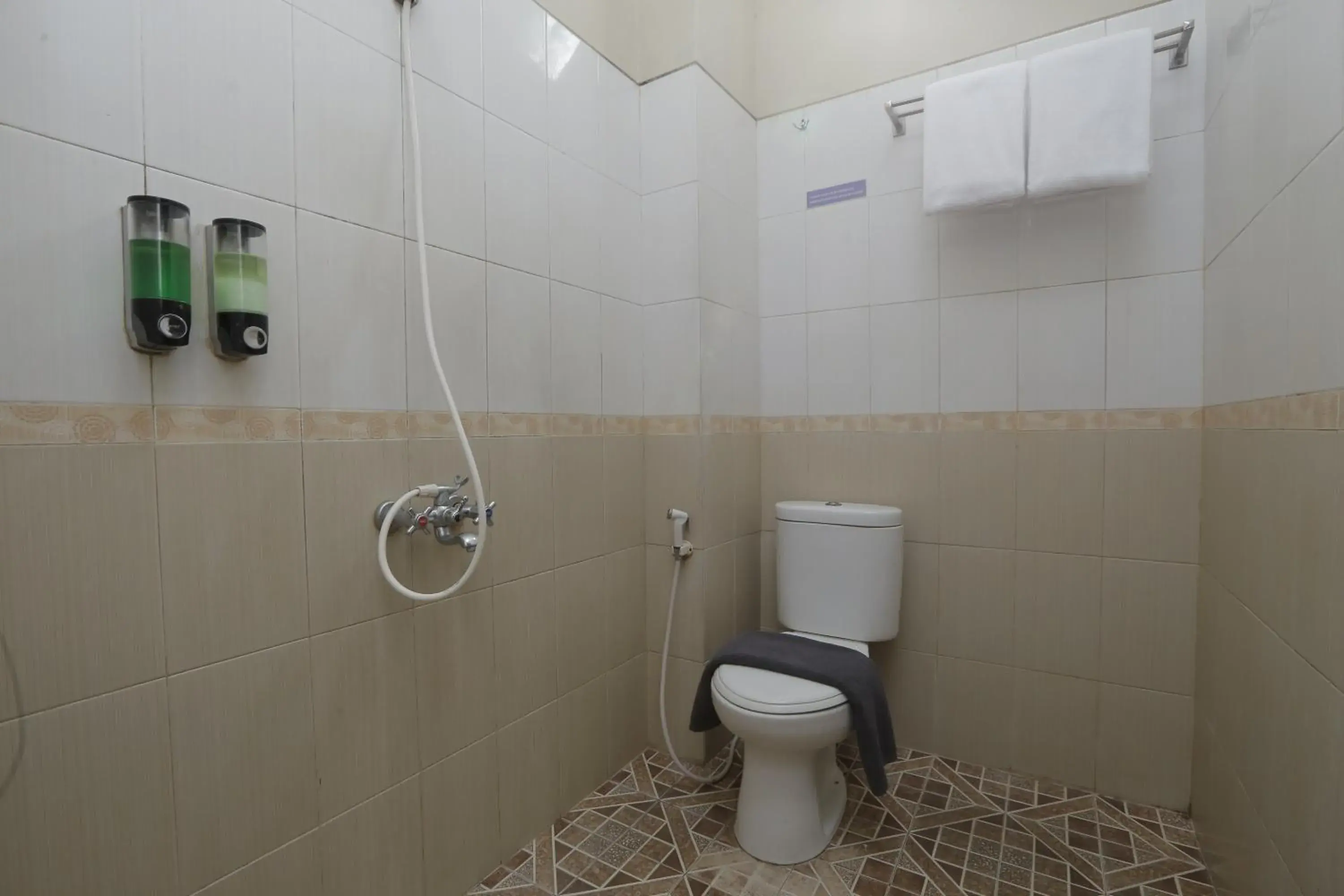 Toilet, Bathroom in Hotel Atalie Malioboro by Natt's Hospitality