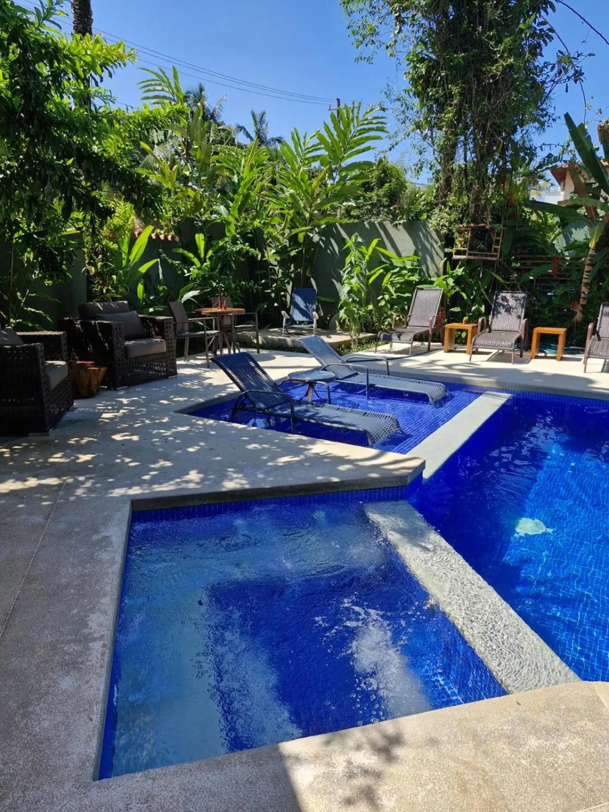 Swimming pool in Pousada Armação de Camburi
