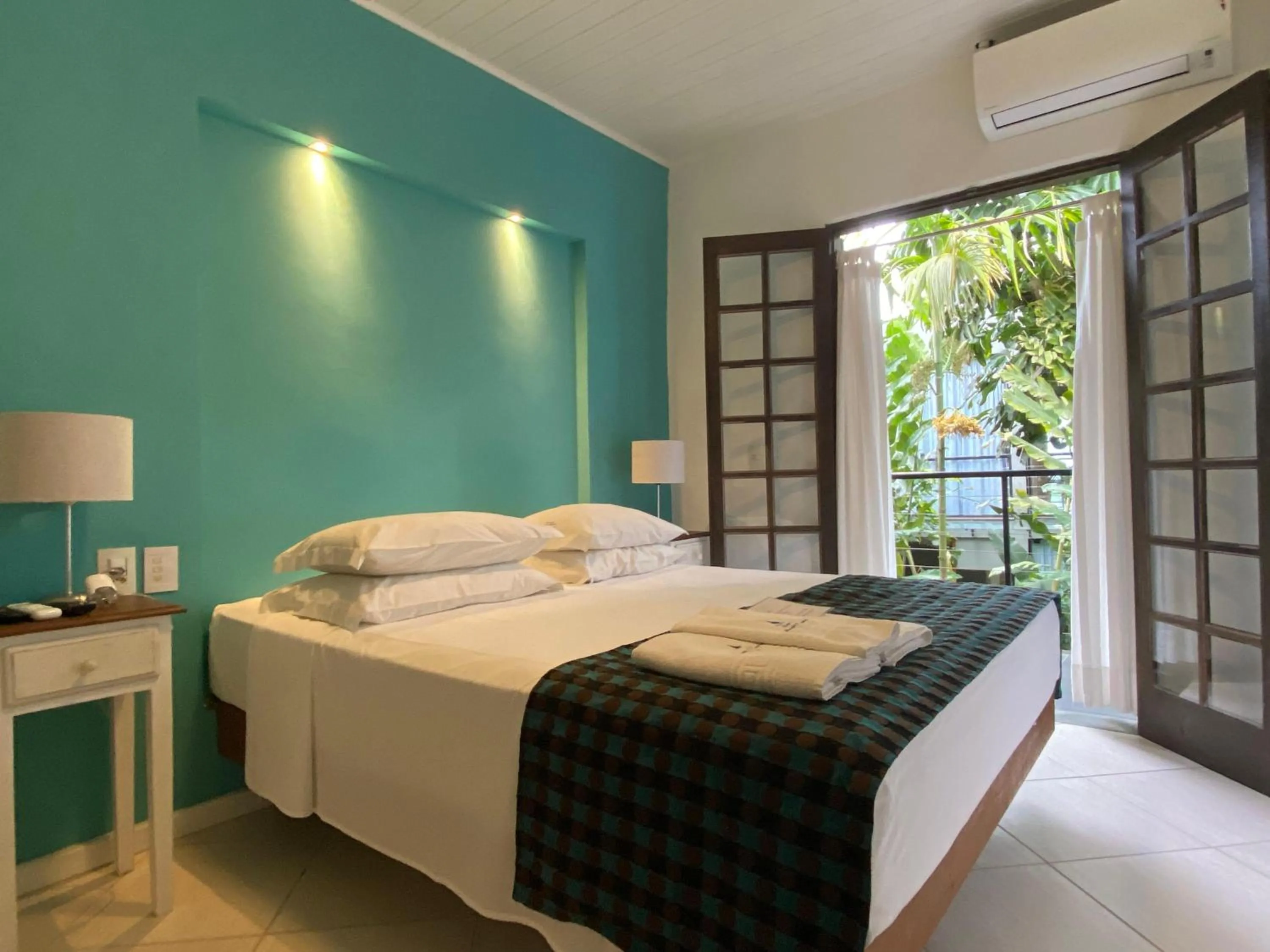 Bedroom, Bed in Pousada Armação de Camburi