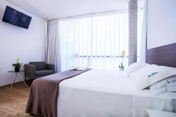 Bedroom, Bed in Pousada Armação de Camburi
