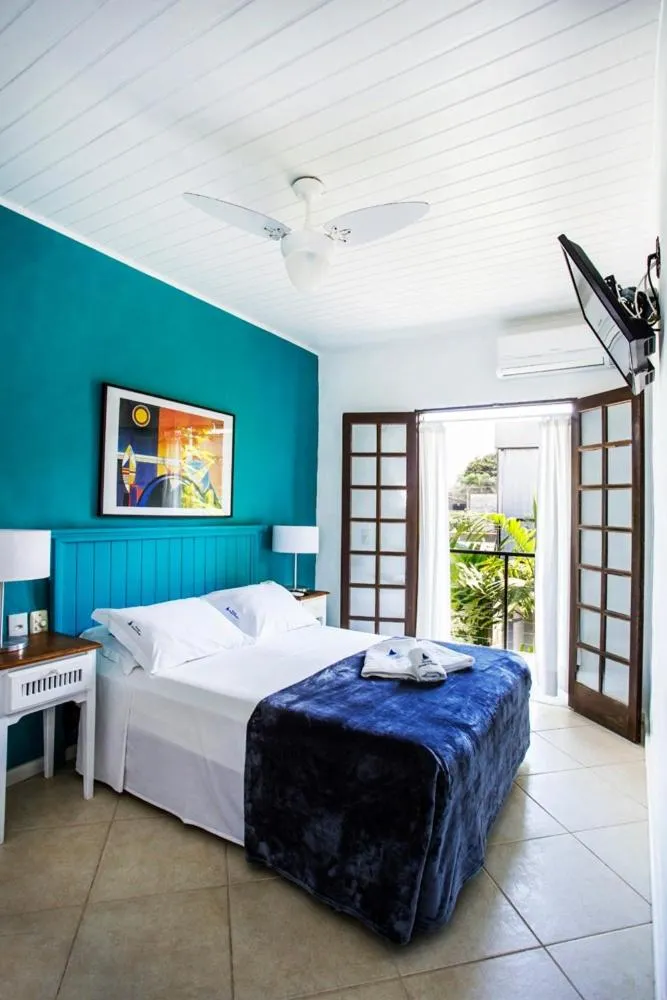 Bedroom, Bed in Pousada Armação de Camburi
