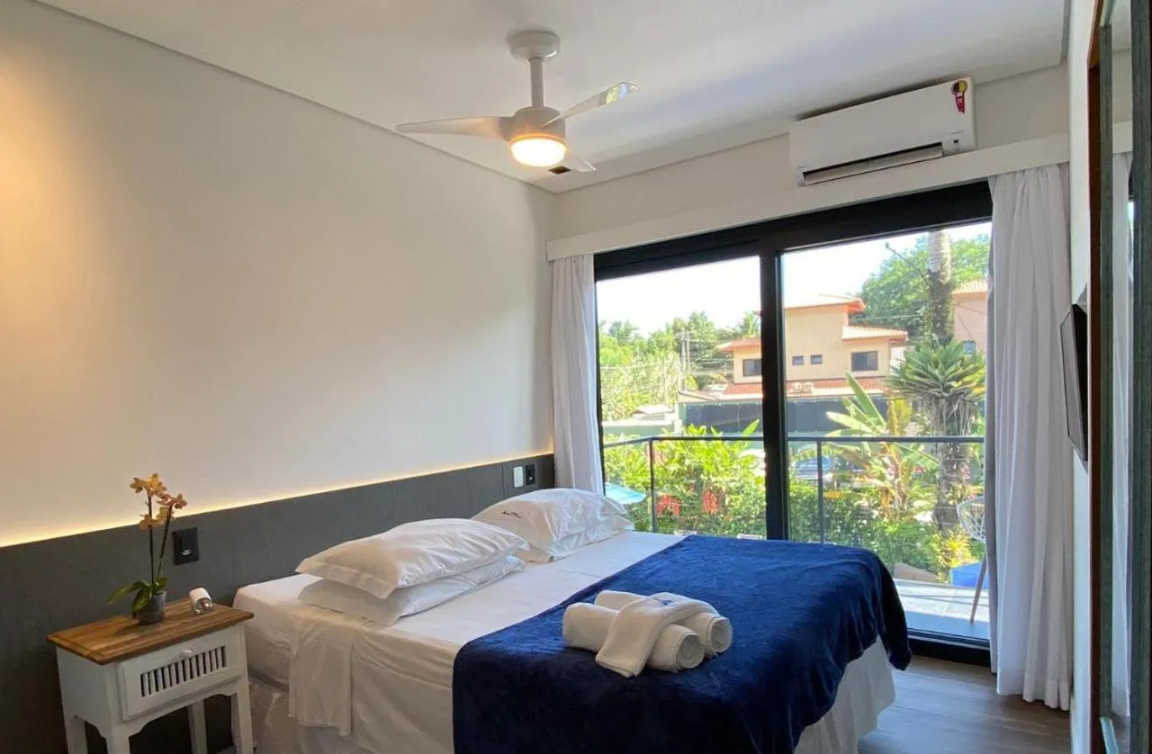 Bedroom, Bed in Pousada Armação de Camburi