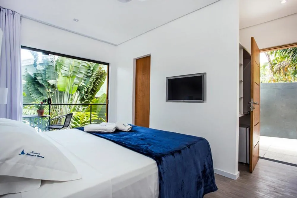 Bedroom, Bed in Pousada Armação de Camburi