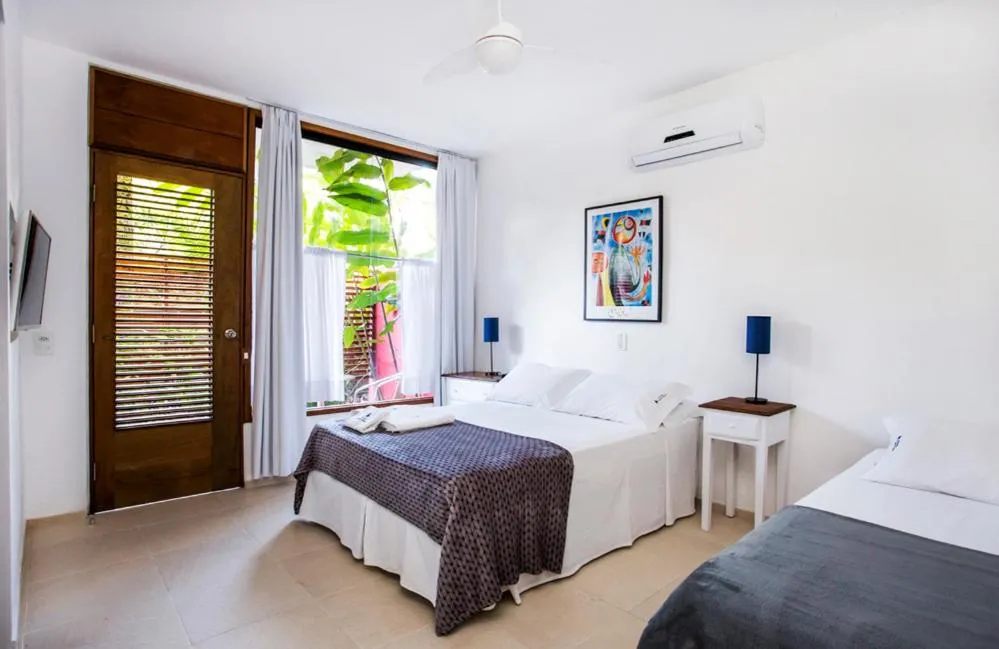 Bedroom, Bed in Pousada Armação de Camburi