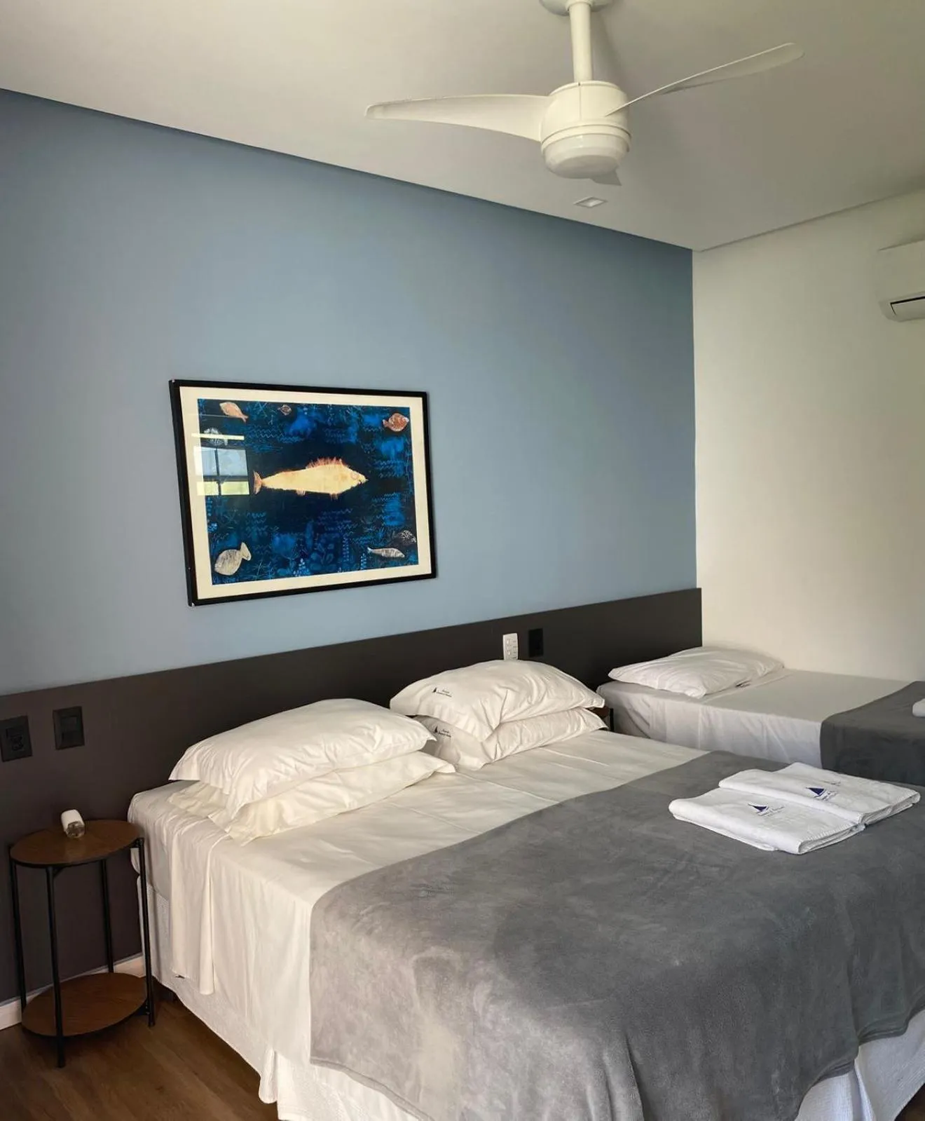 Bed in Pousada Armação de Camburi