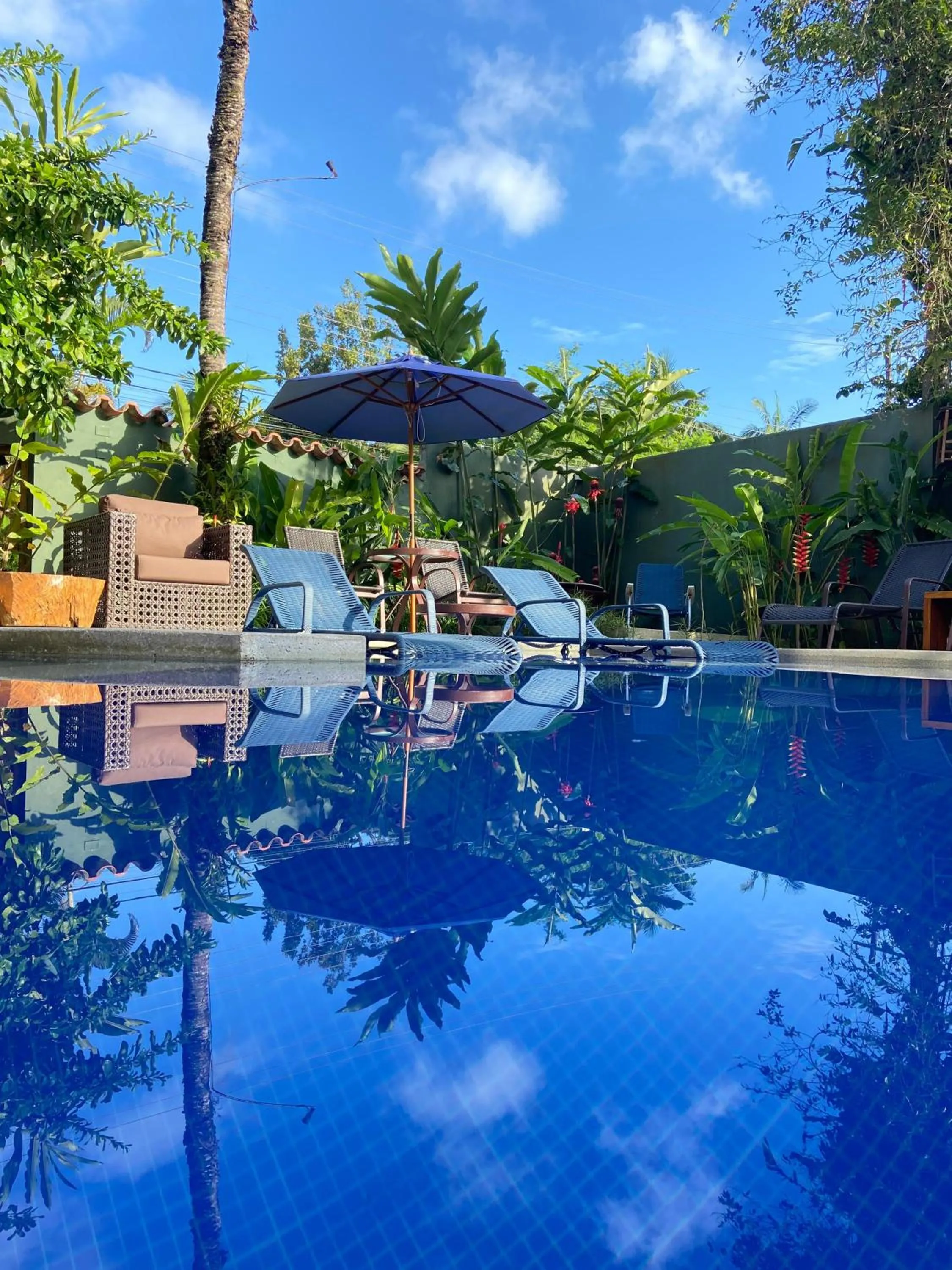 Swimming pool in Pousada Armação de Camburi