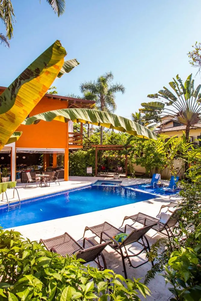 Swimming pool in Pousada Armação de Camburi