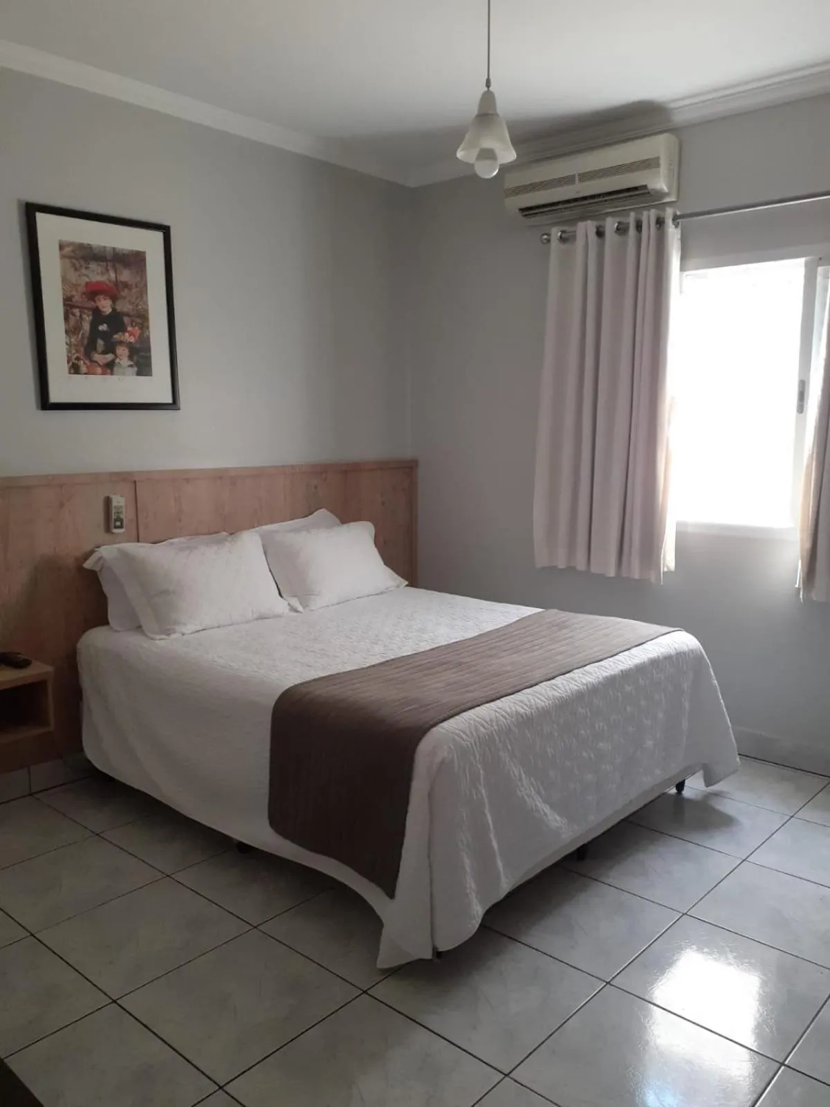 Bed in Rio Claro Plaza Hotel