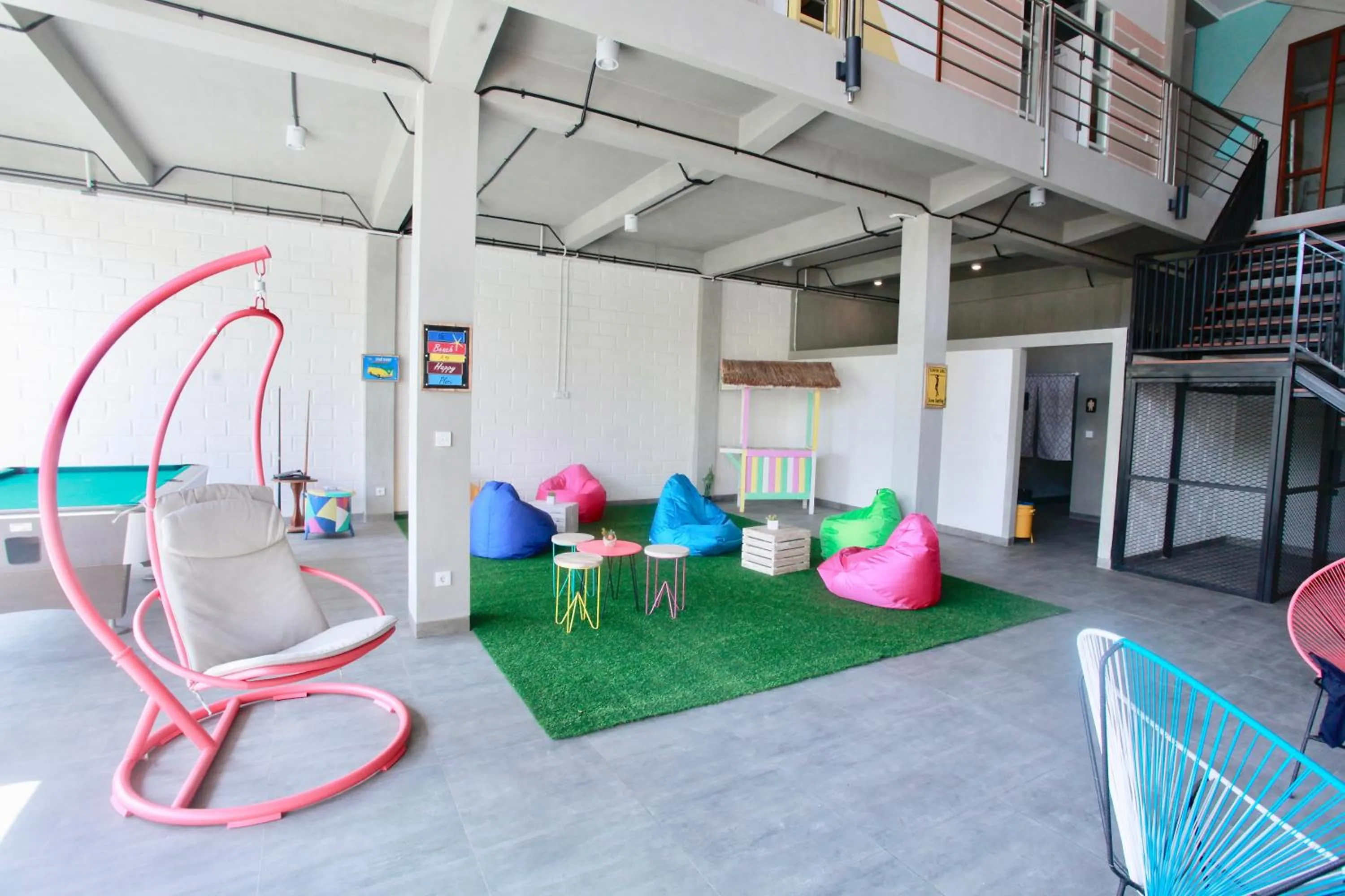 Communal lounge/ TV room in Beach Hut Hostel