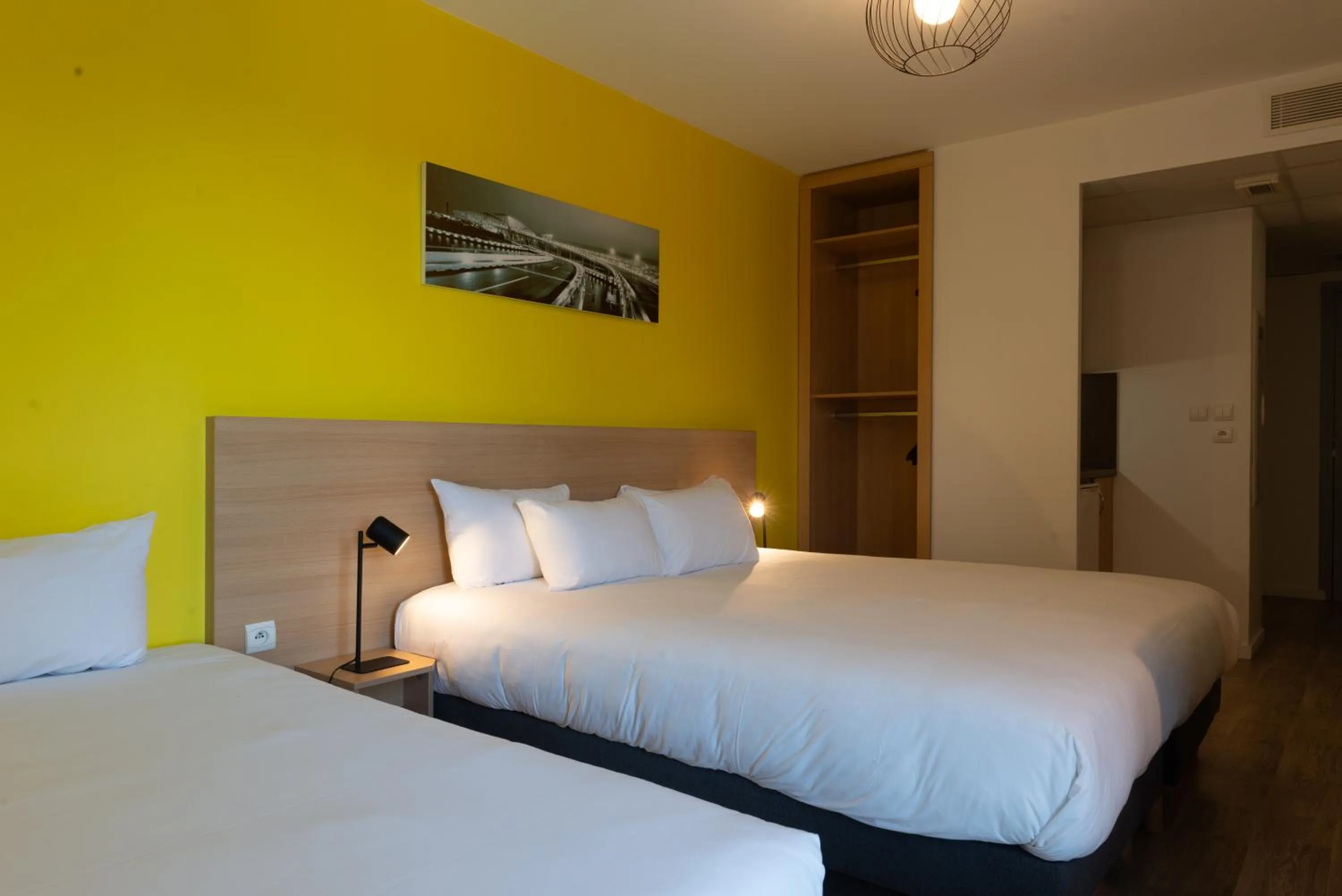 Bed in EastLodge Lyon Est Eurexpo