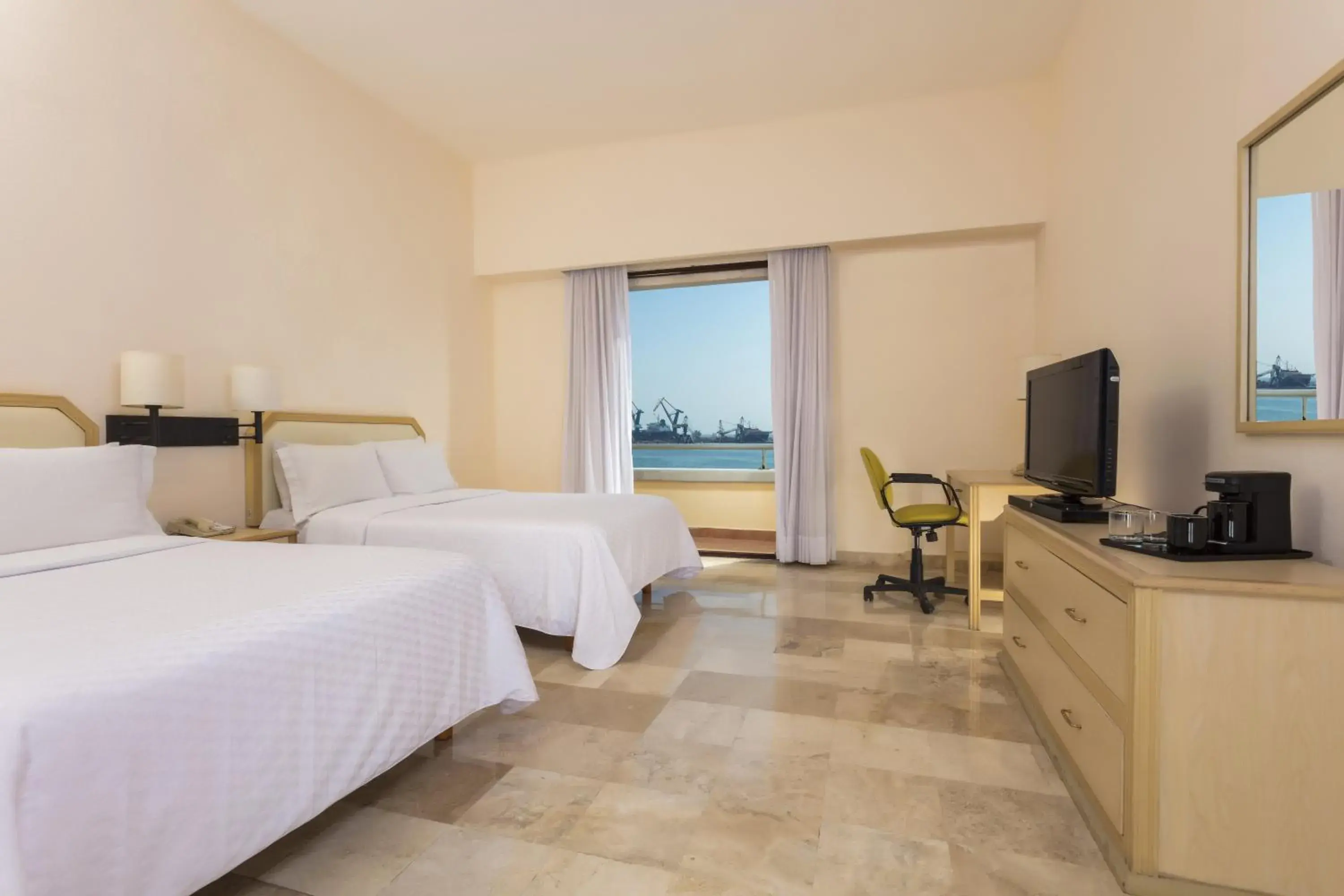 Photo of the whole room, Bed in Fiesta Inn Veracruz Malecon Photo of the whole room, Bed in Fiesta Inn Veracruz Malecon