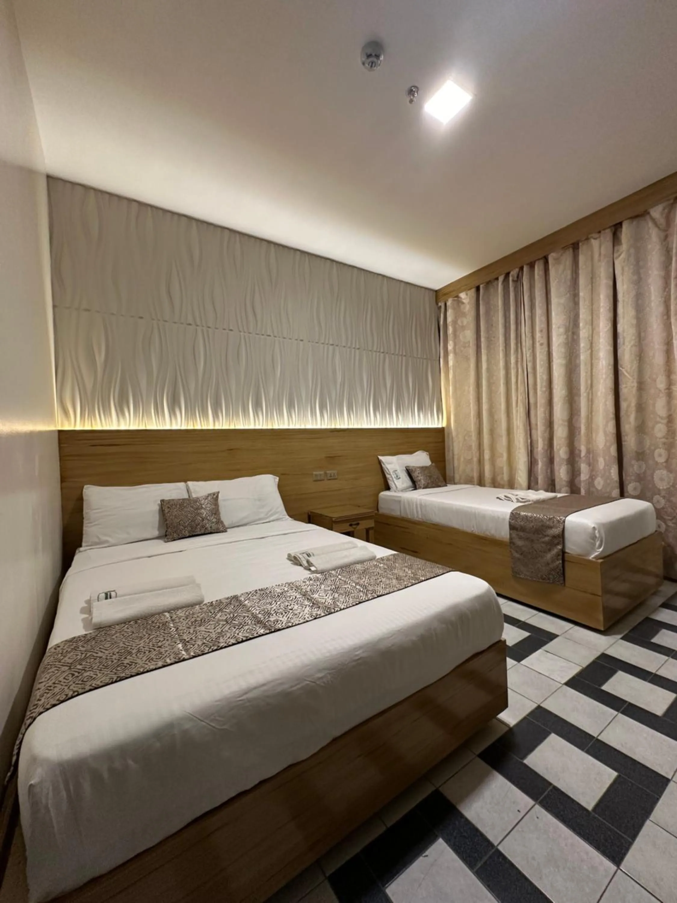 Bed in Bamboo Garden Bussiness Inn