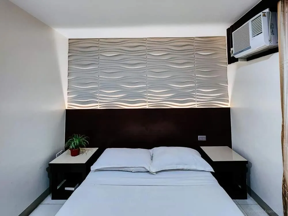 Bed in Bamboo Garden Bussiness Inn