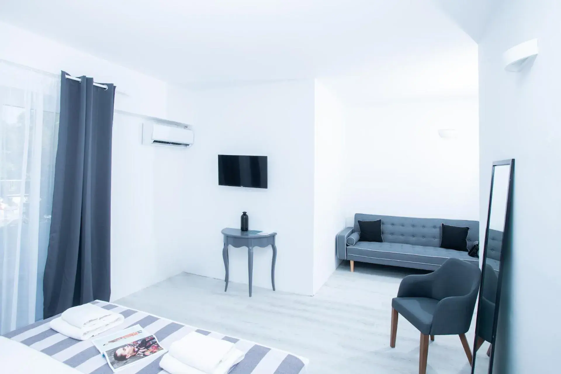 Seating area, Bed in Bianco Olympico Beach Resort-All Inclusive Seating area, Bed in Bianco Olympico Beach Resort-All Inclusive