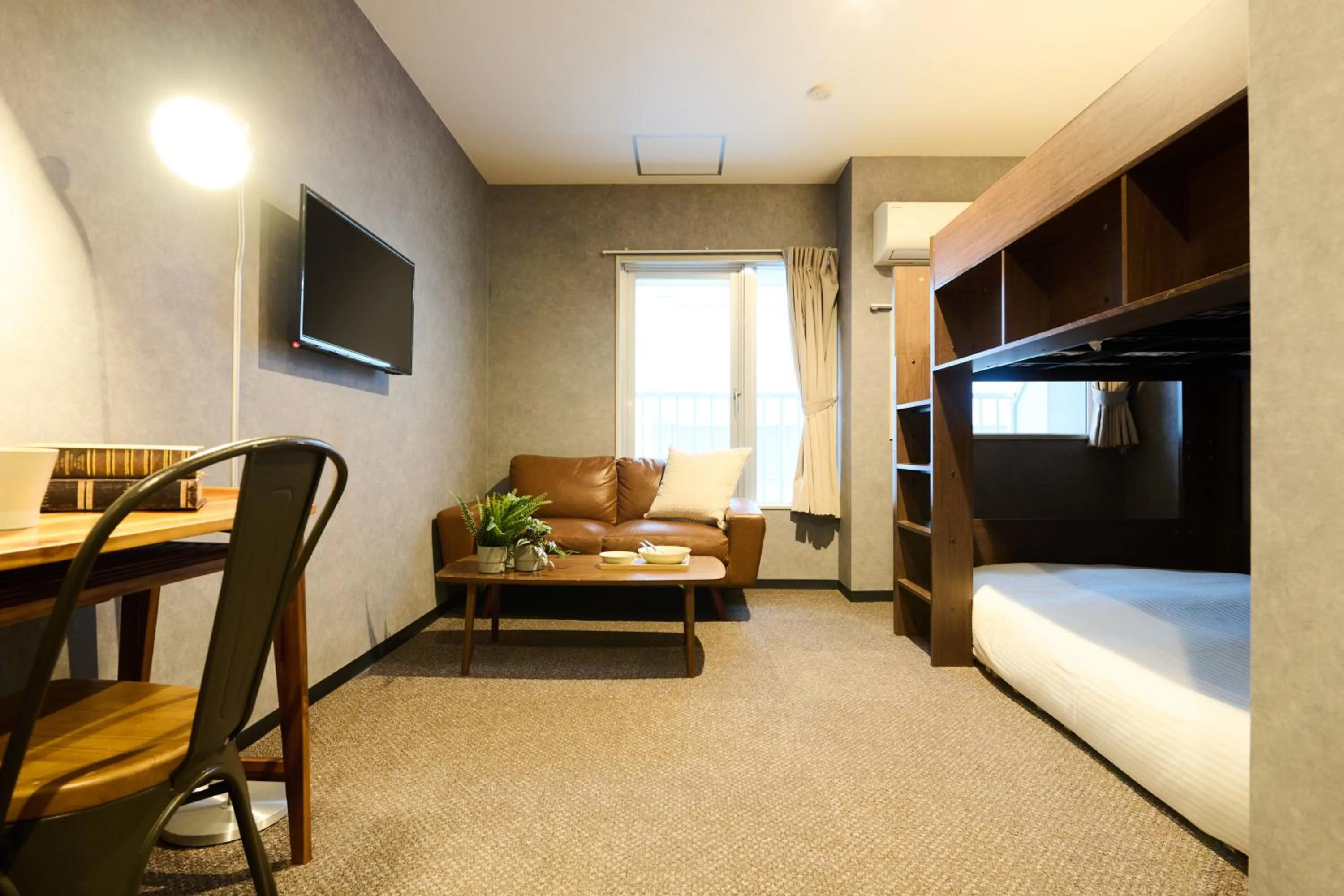 Bed in Residence Hotel Stripe Sapporo