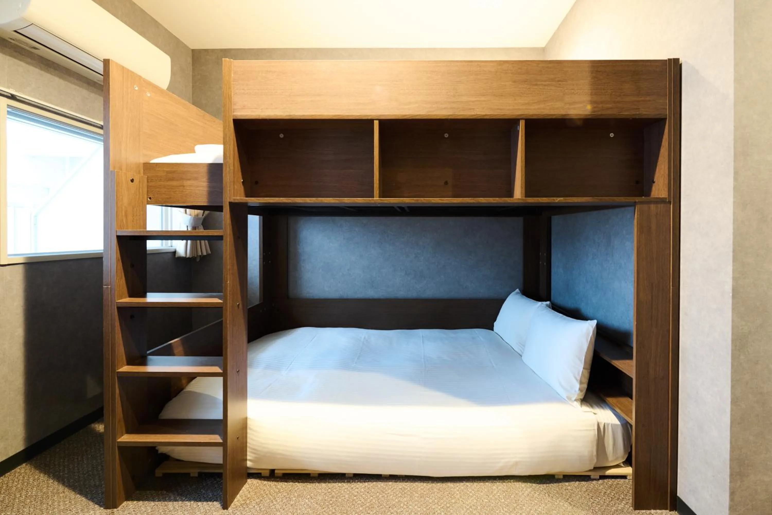 Bed in Residence Hotel Stripe Sapporo