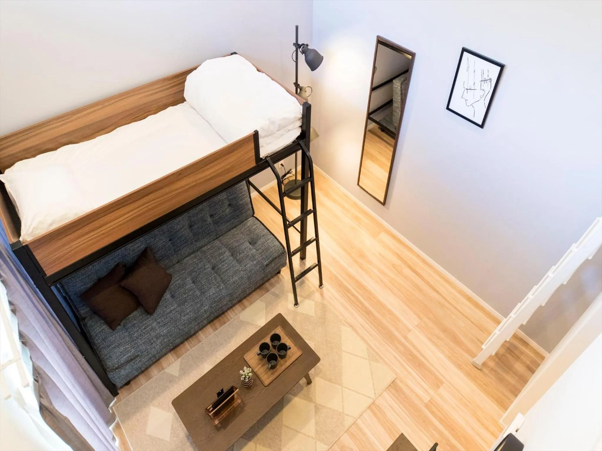 Living room, Bed in TRIP POD MINOSHIMA A