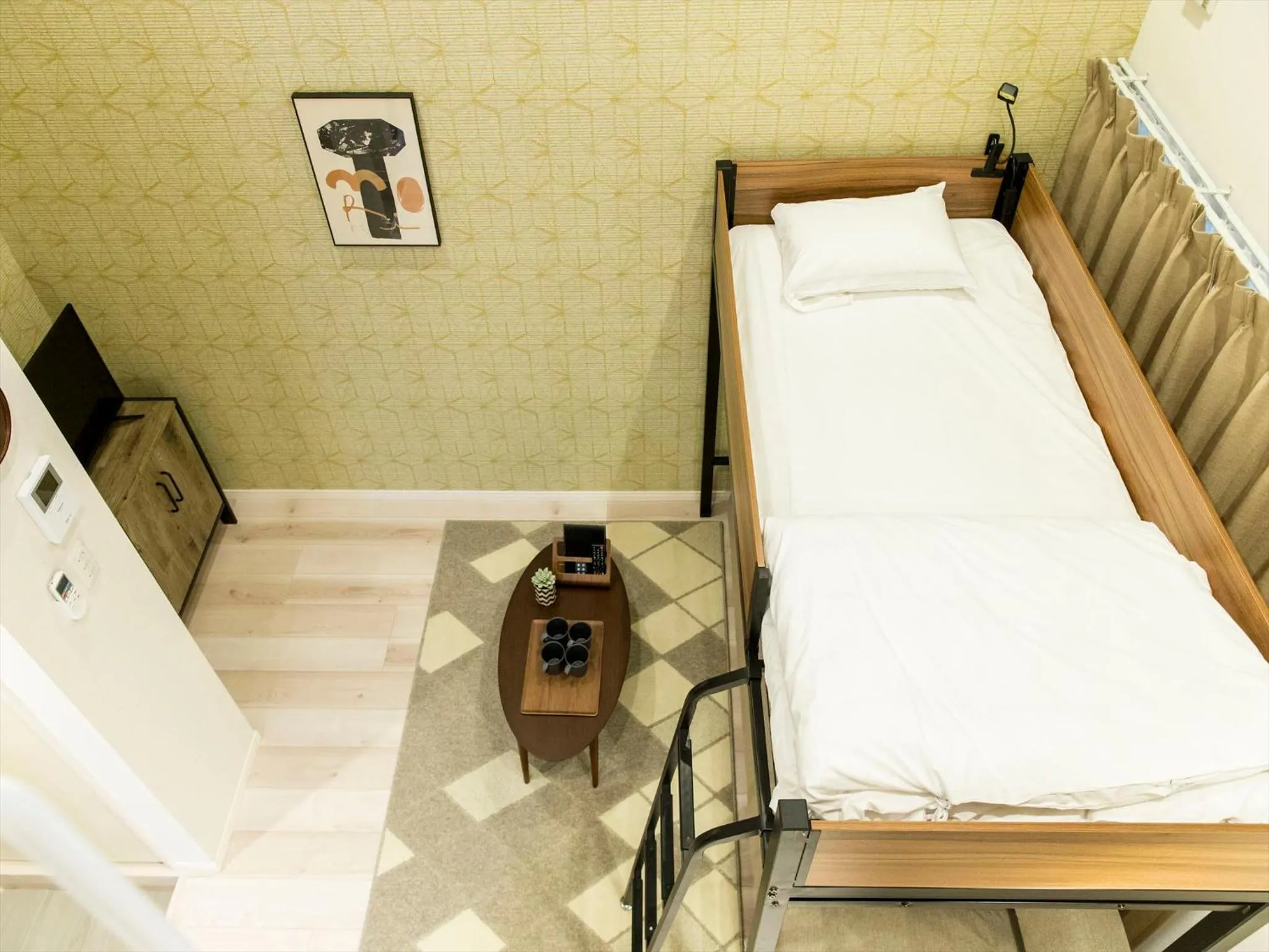 Living room, Bed in TRIP POD SUMIYOSHI B