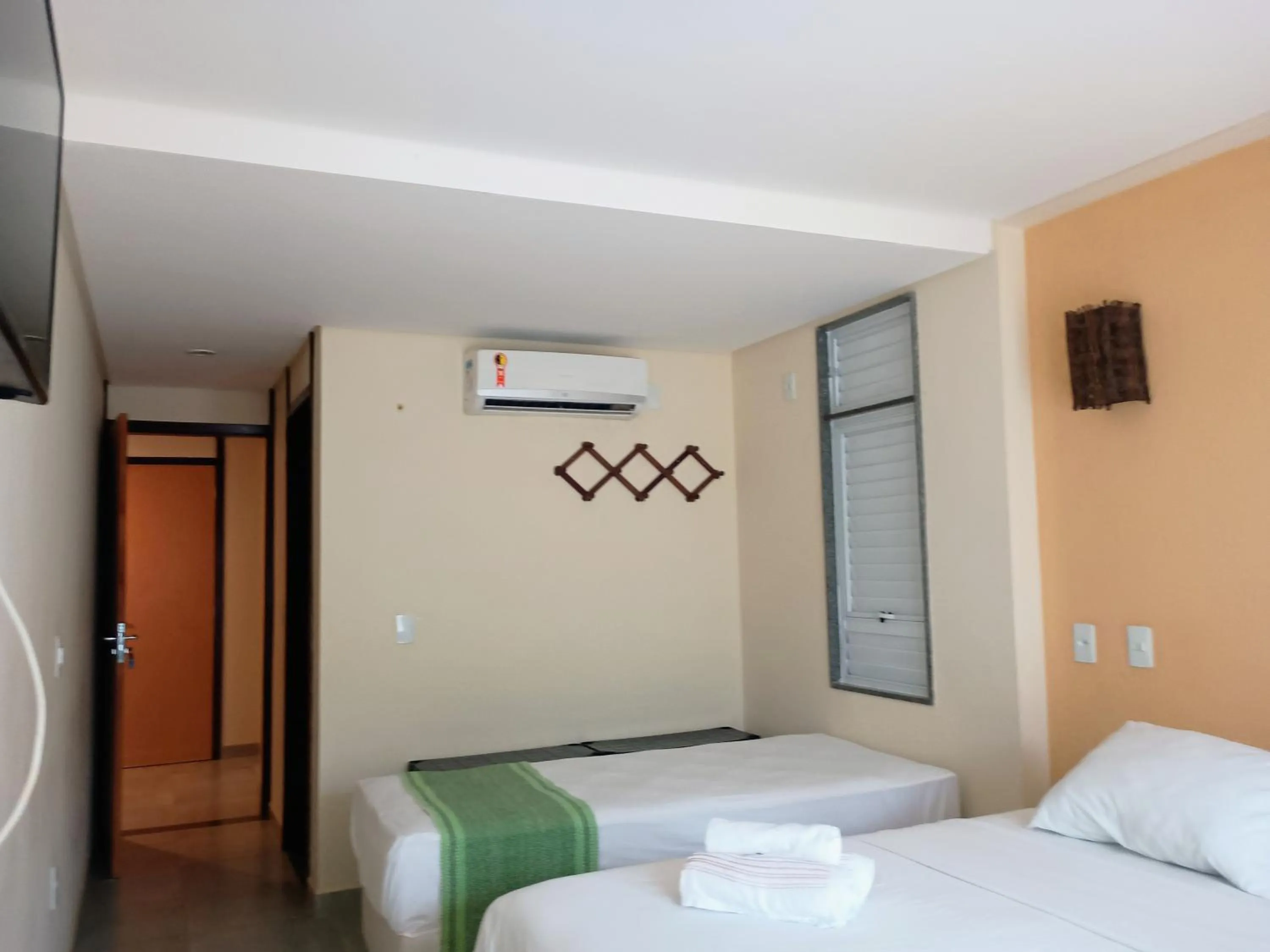 Photo of the whole room, Bed in Pousada Laguna