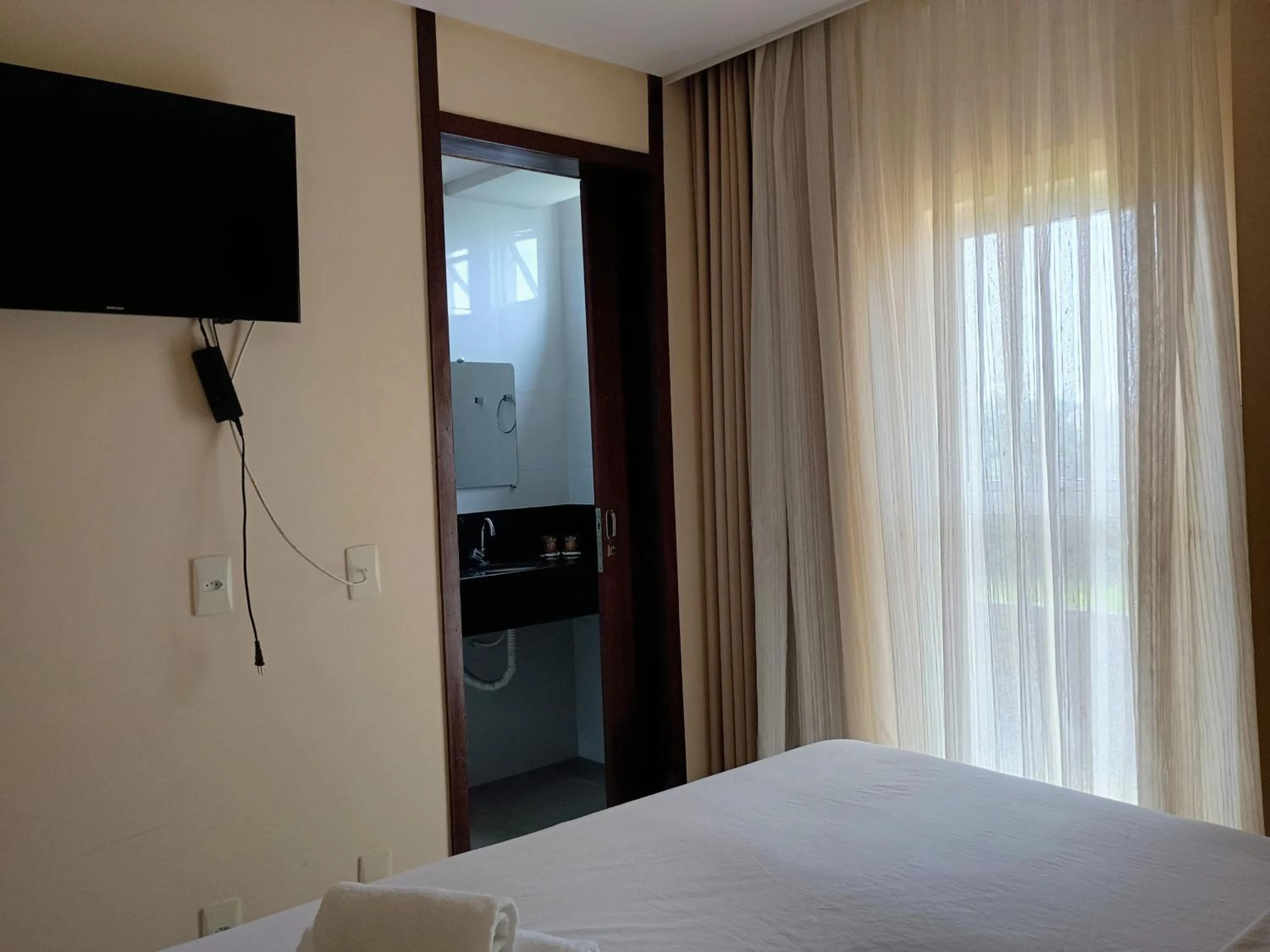 Photo of the whole room, Bed in Pousada Laguna