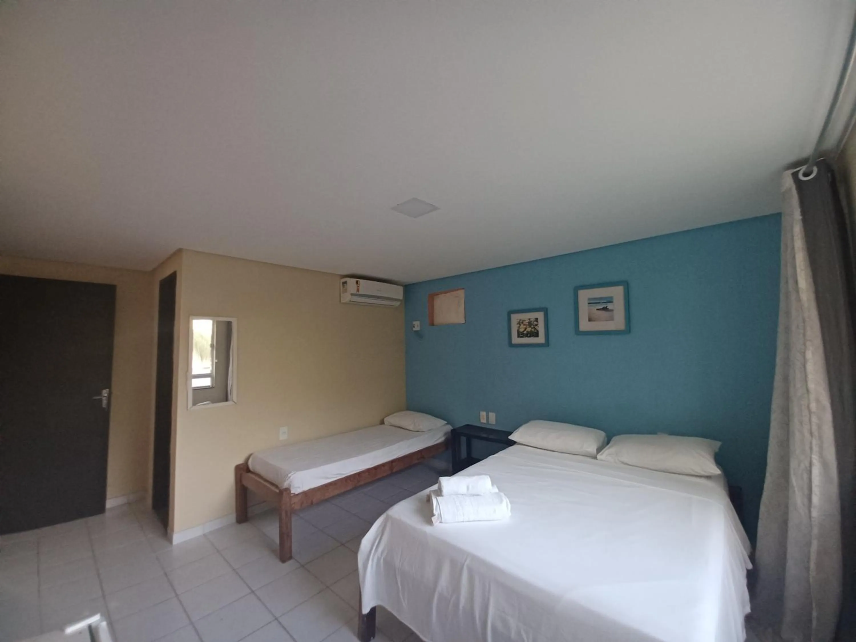 Bed in Pousada Laguna