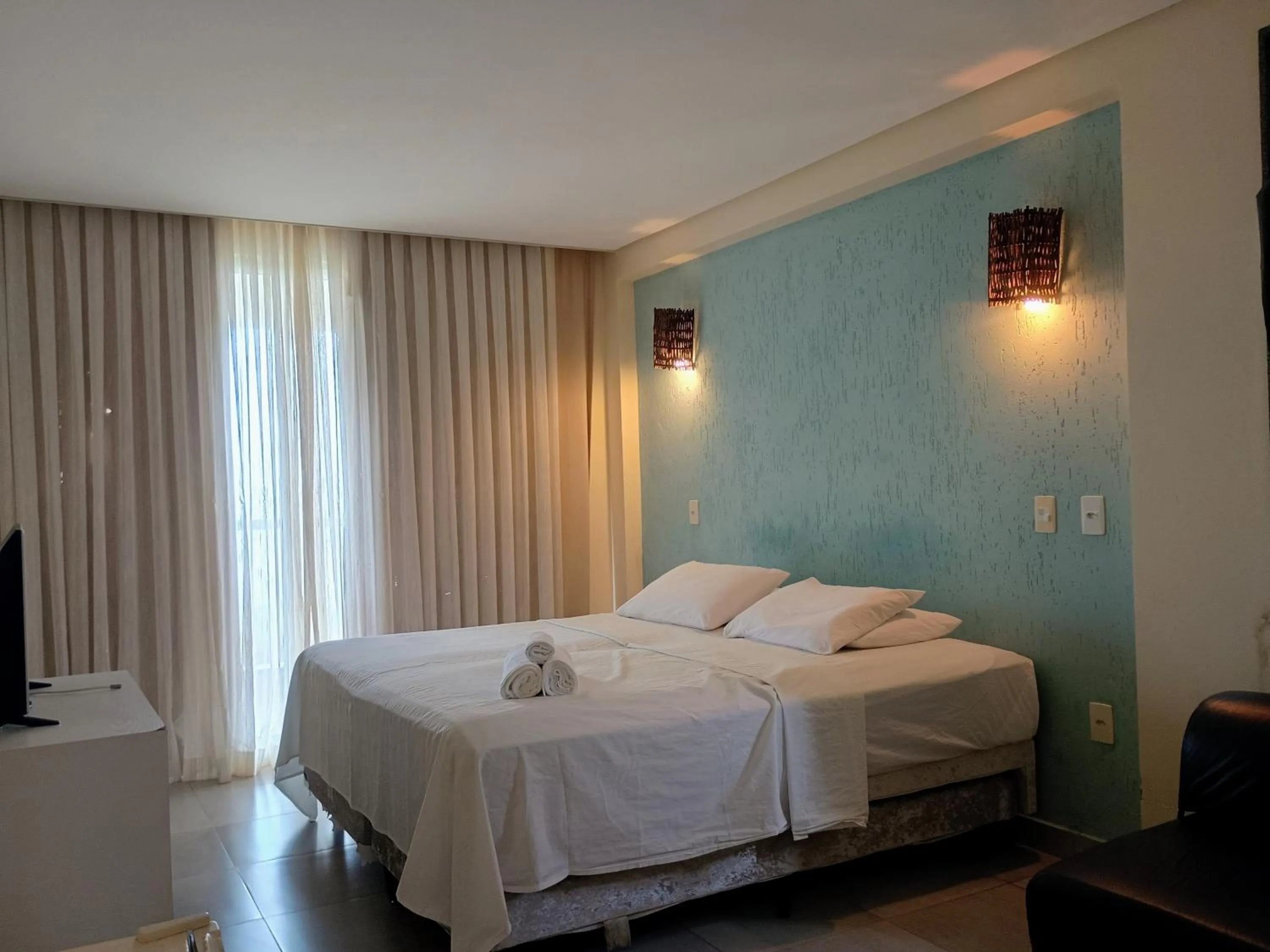 Photo of the whole room, Bed in Pousada Laguna