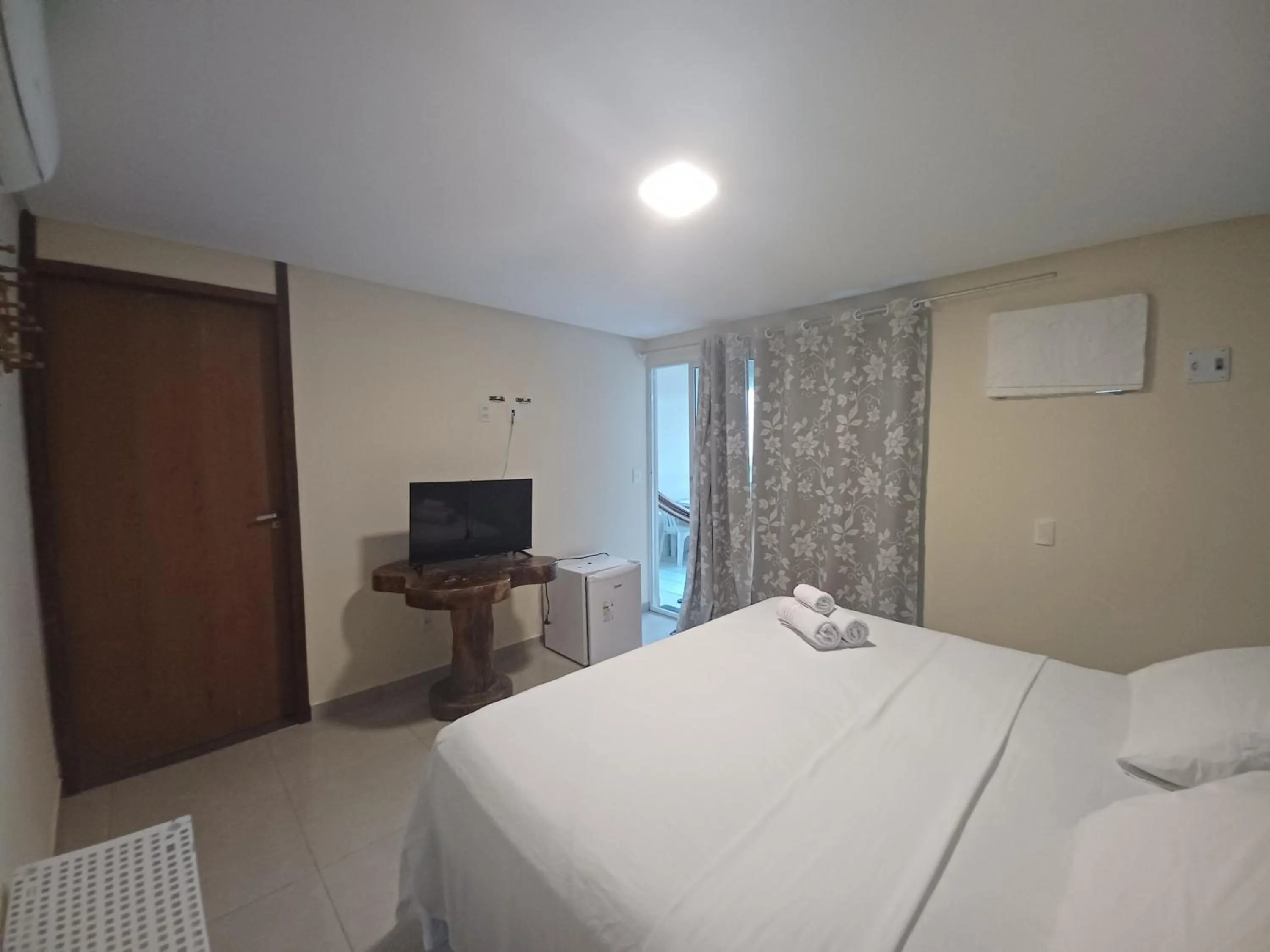 Bed in Pousada Laguna