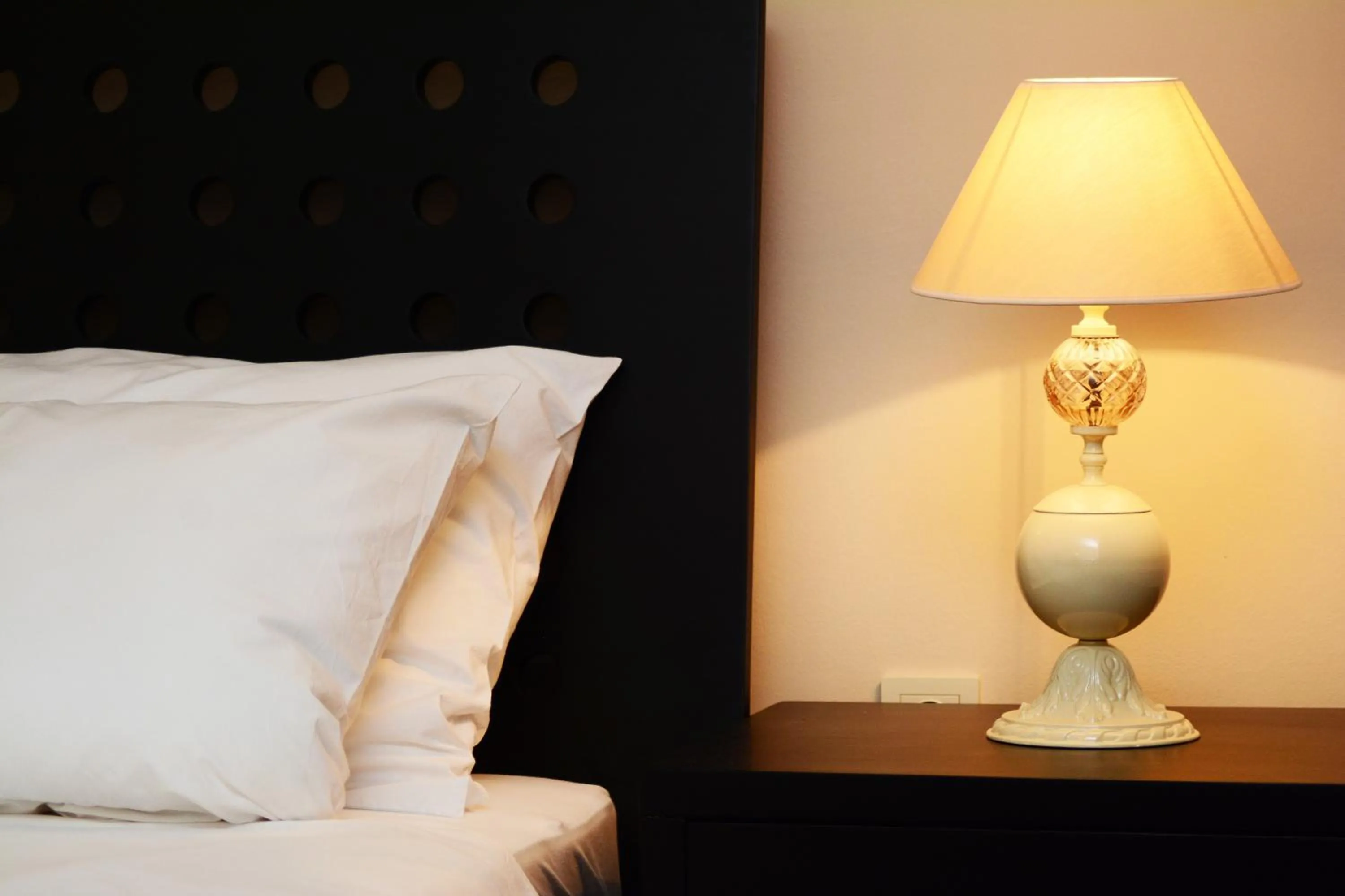 Decorative detail, Bed in Luxury Room Uzorita B&B