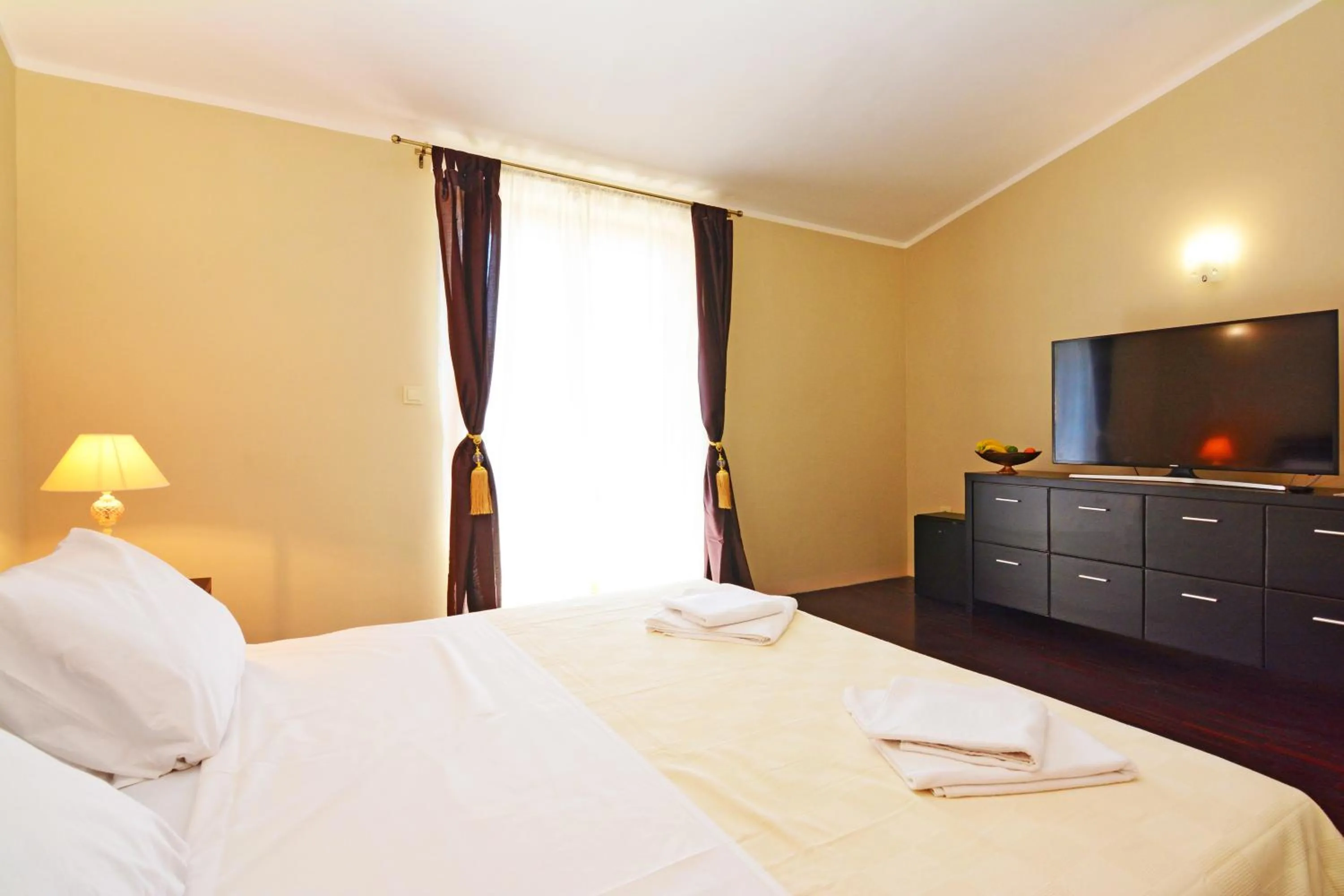 Bed in Luxury Room Uzorita B&B
