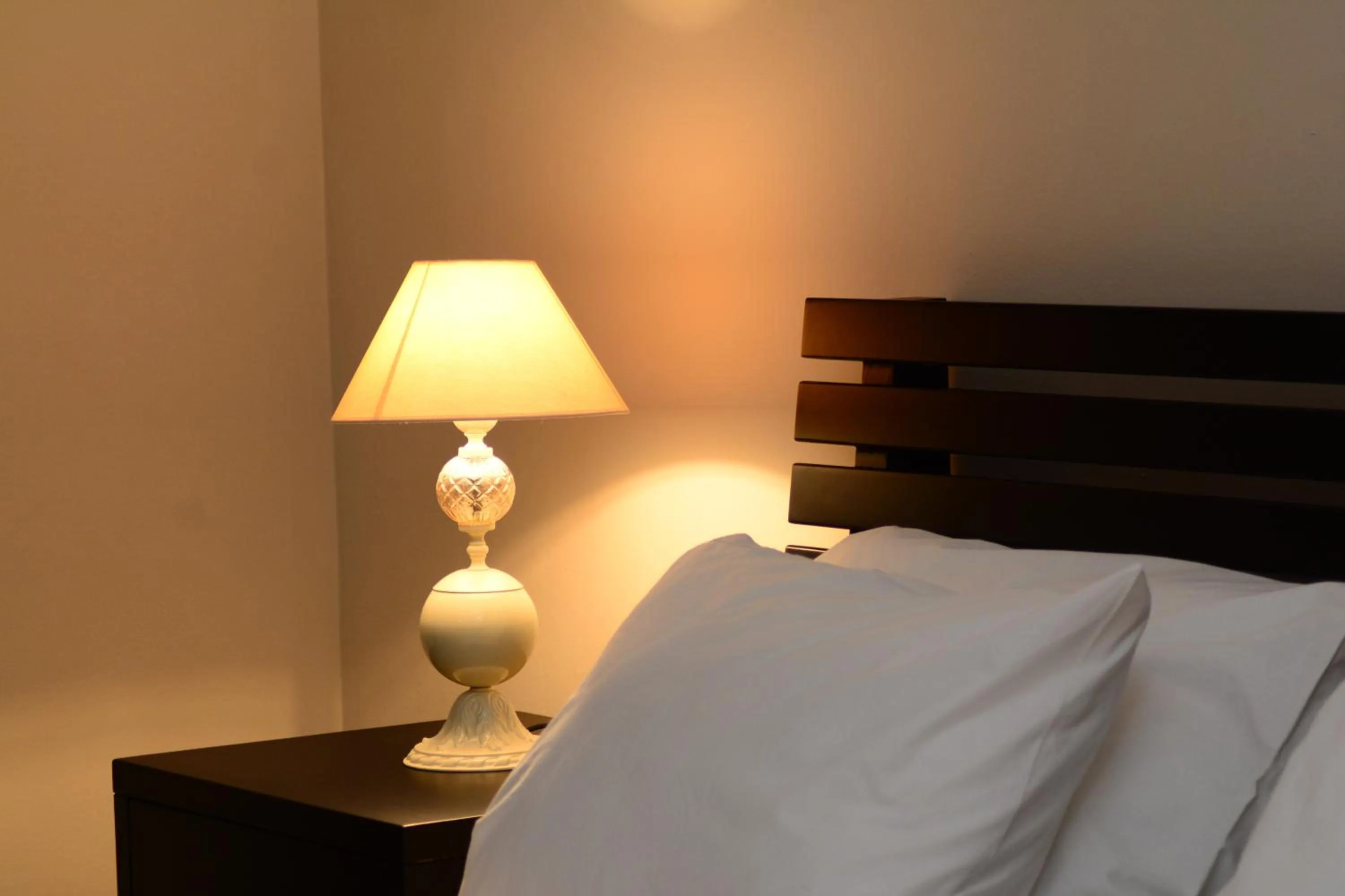 Decorative detail, Bed in Luxury Room Uzorita B&B