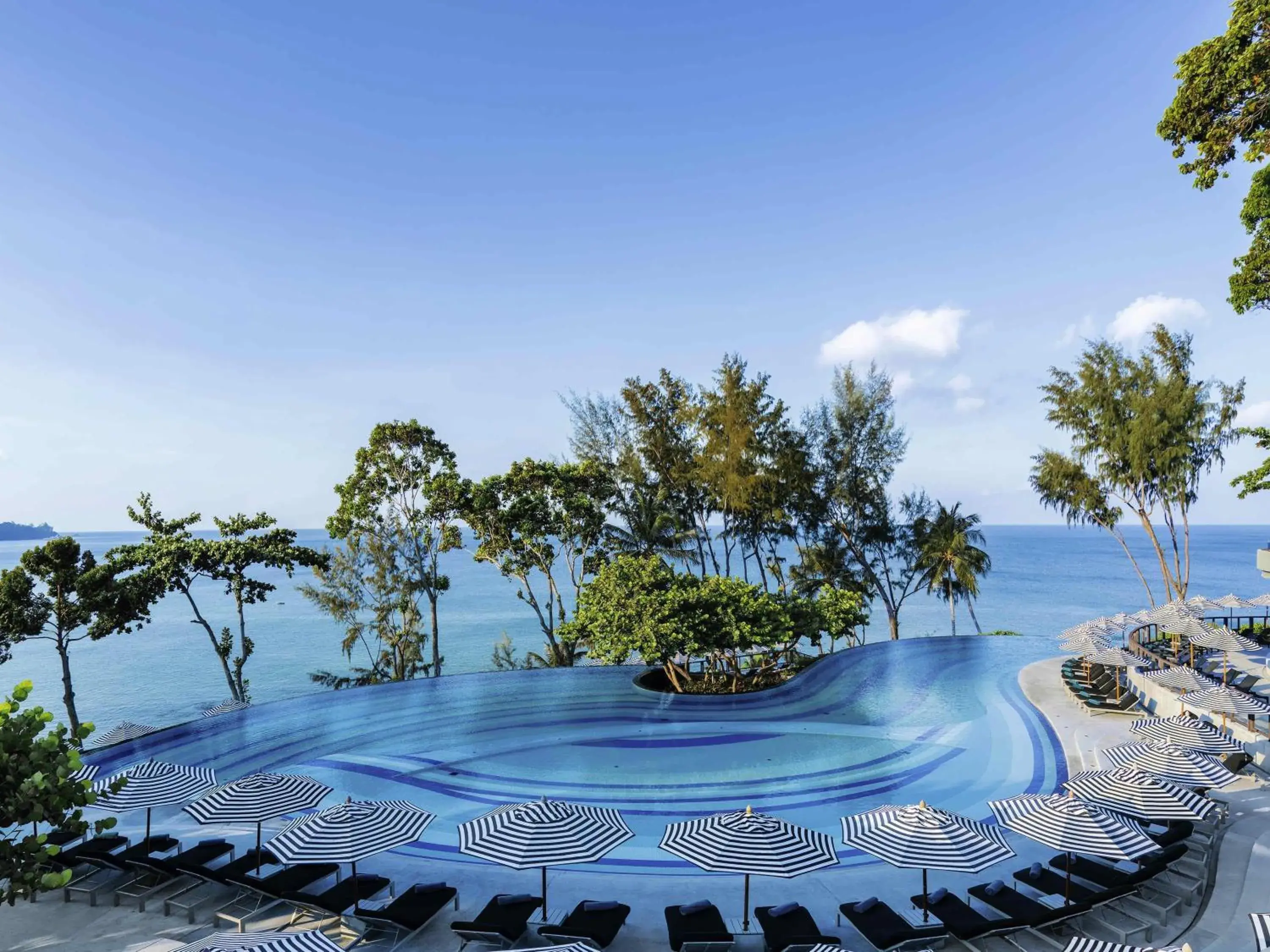 Pool view in Pullman Phuket Arcadia Naithon Beach Pool view in Pullman Phuket Arcadia Naithon Beach