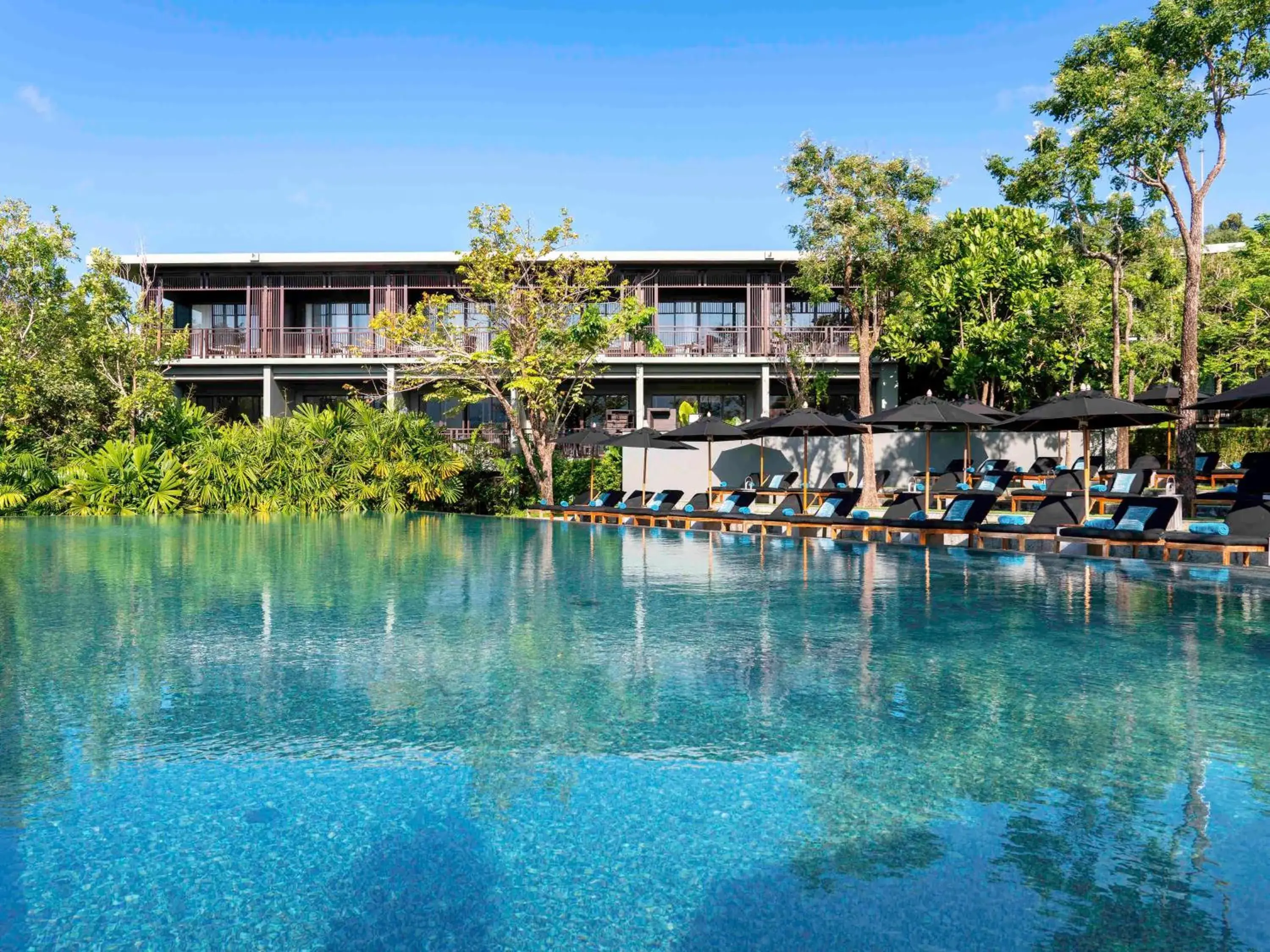 Pool view in Pullman Phuket Arcadia Naithon Beach Pool view in Pullman Phuket Arcadia Naithon Beach