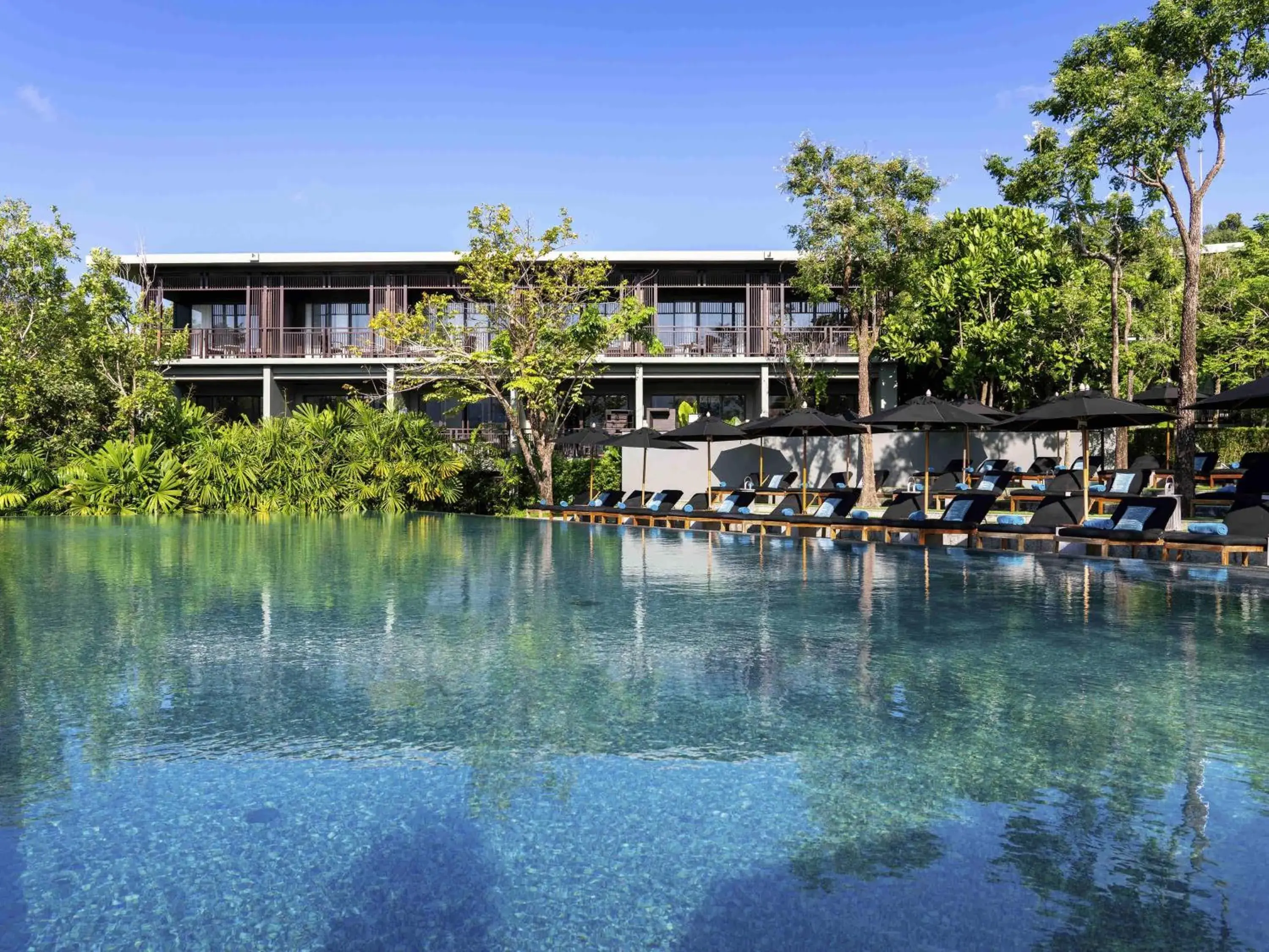 Pool view in Pullman Phuket Arcadia Naithon Beach Pool view in Pullman Phuket Arcadia Naithon Beach