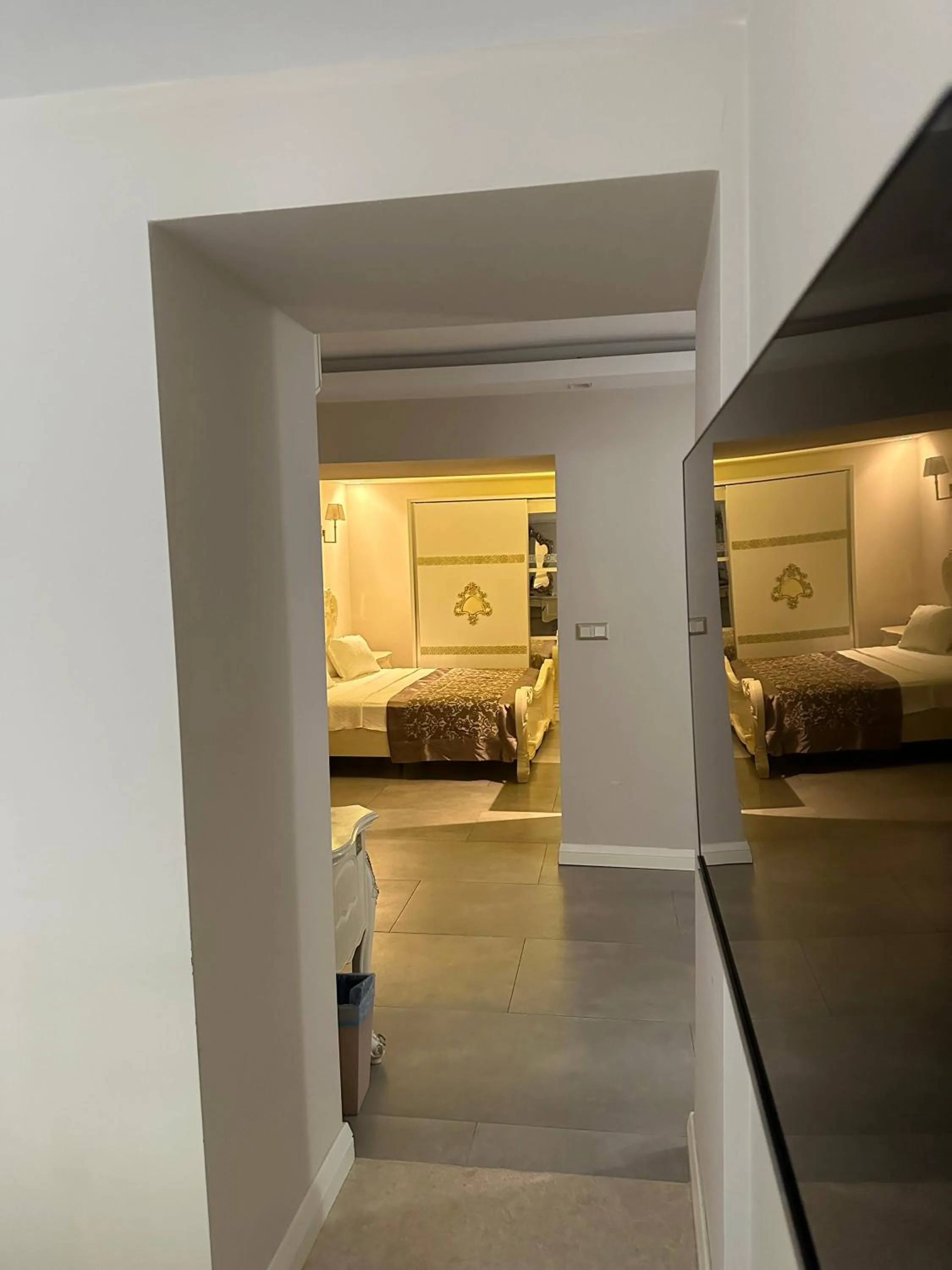 Bed in Elegance East Hotel