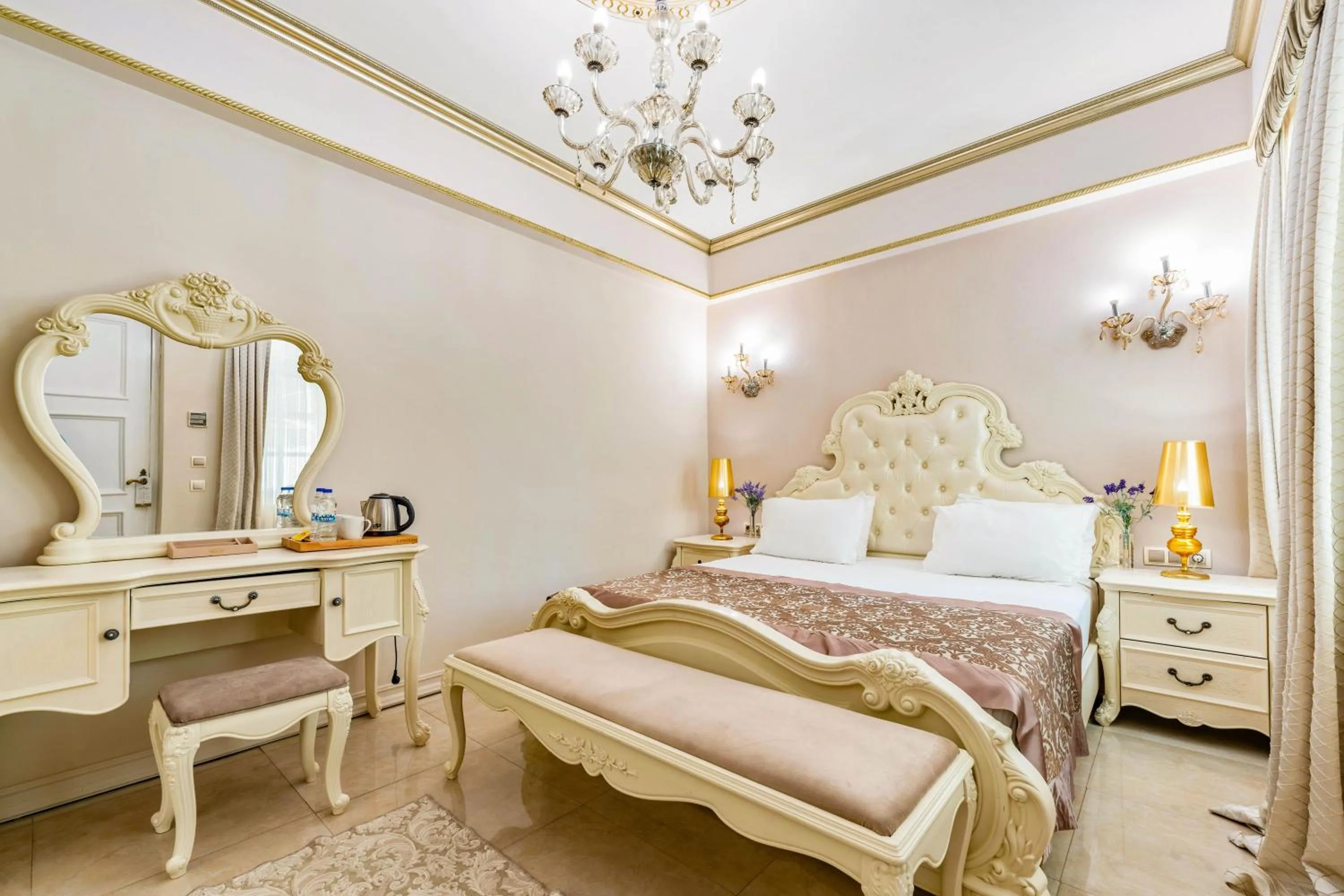 Bed in Elegance East Hotel