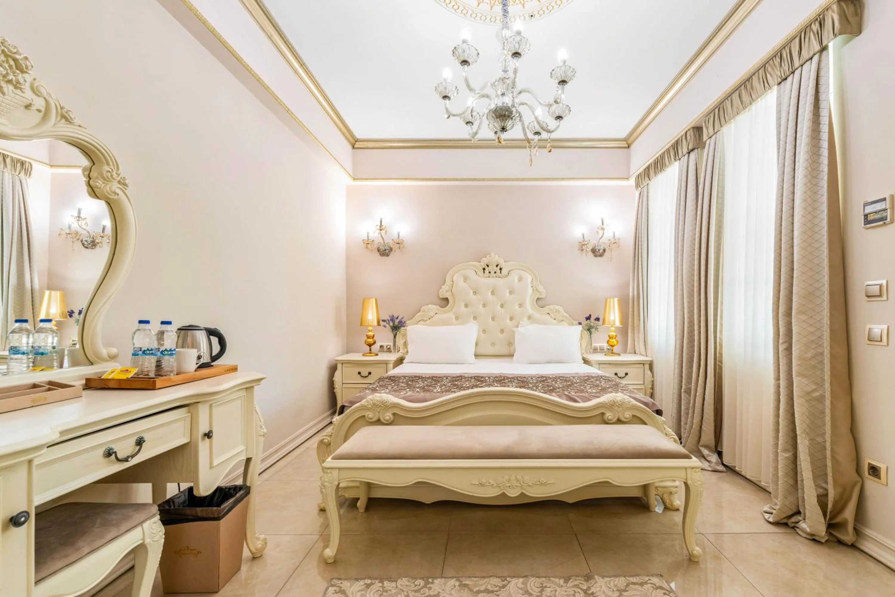 Bed in Elegance East Hotel