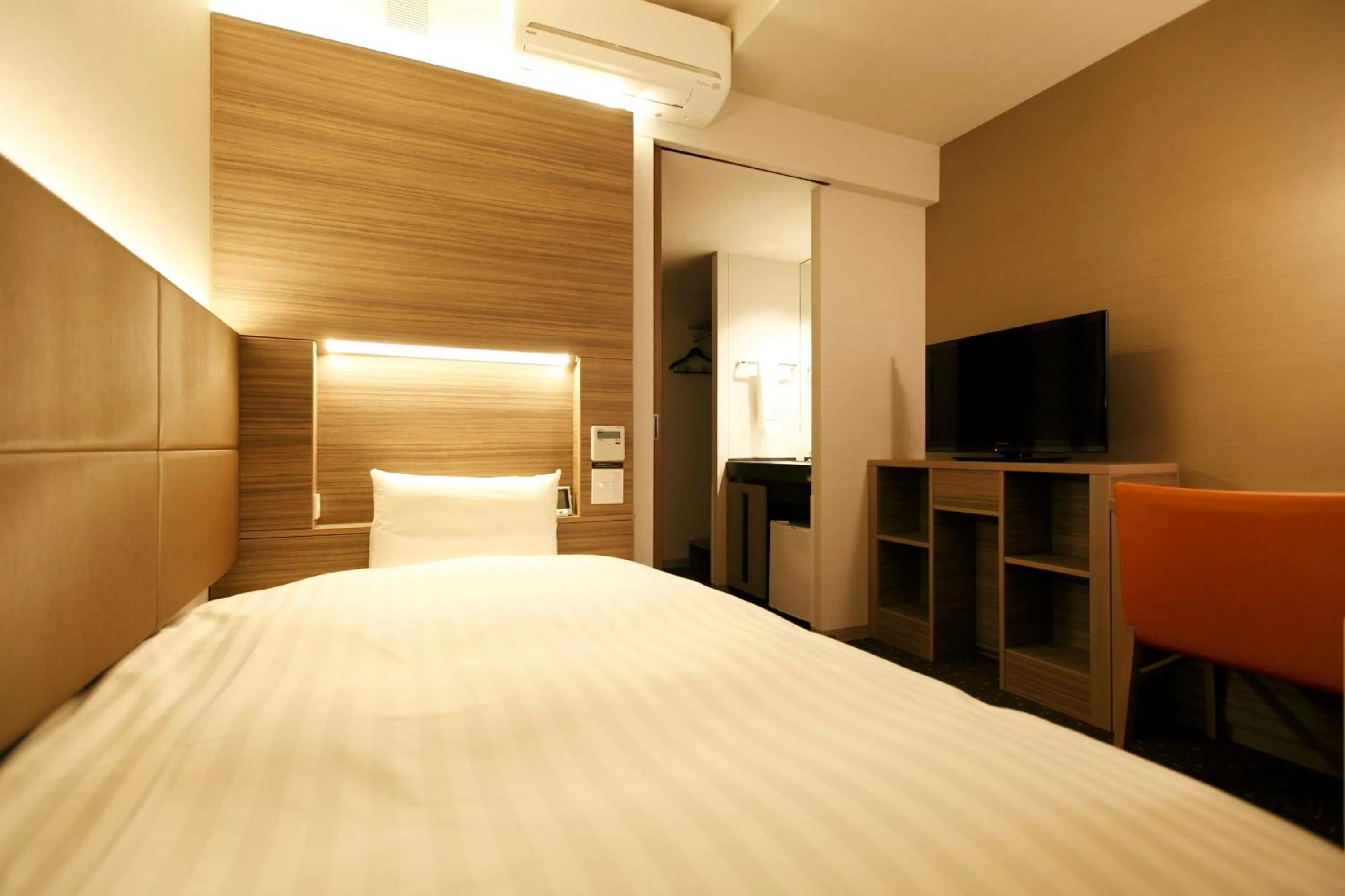 Bed in Dormy Inn Kagoshima