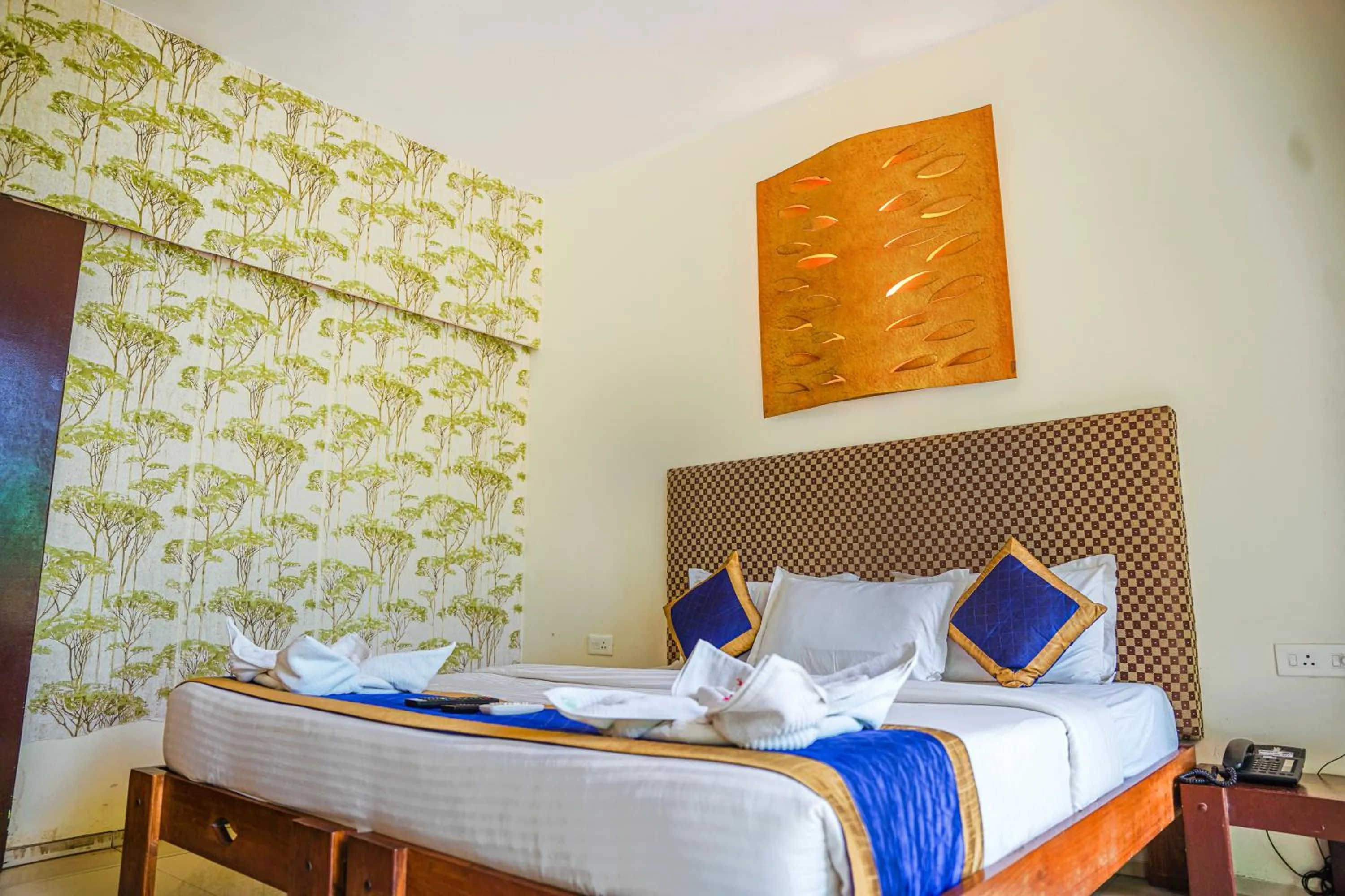 Bed in Sharanam Green Resort